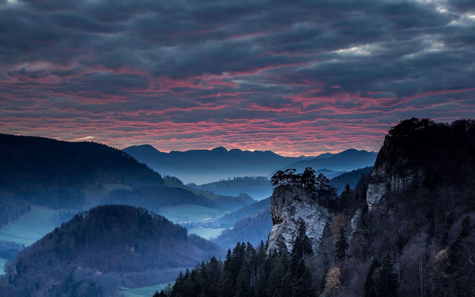 Rocky cliff outcrop, Misty forested valley, Pink sunset clouds Rocky cliff outcrop, Misty forested valley, Pink sunset clouds — 1920×1200 HD wallpaper