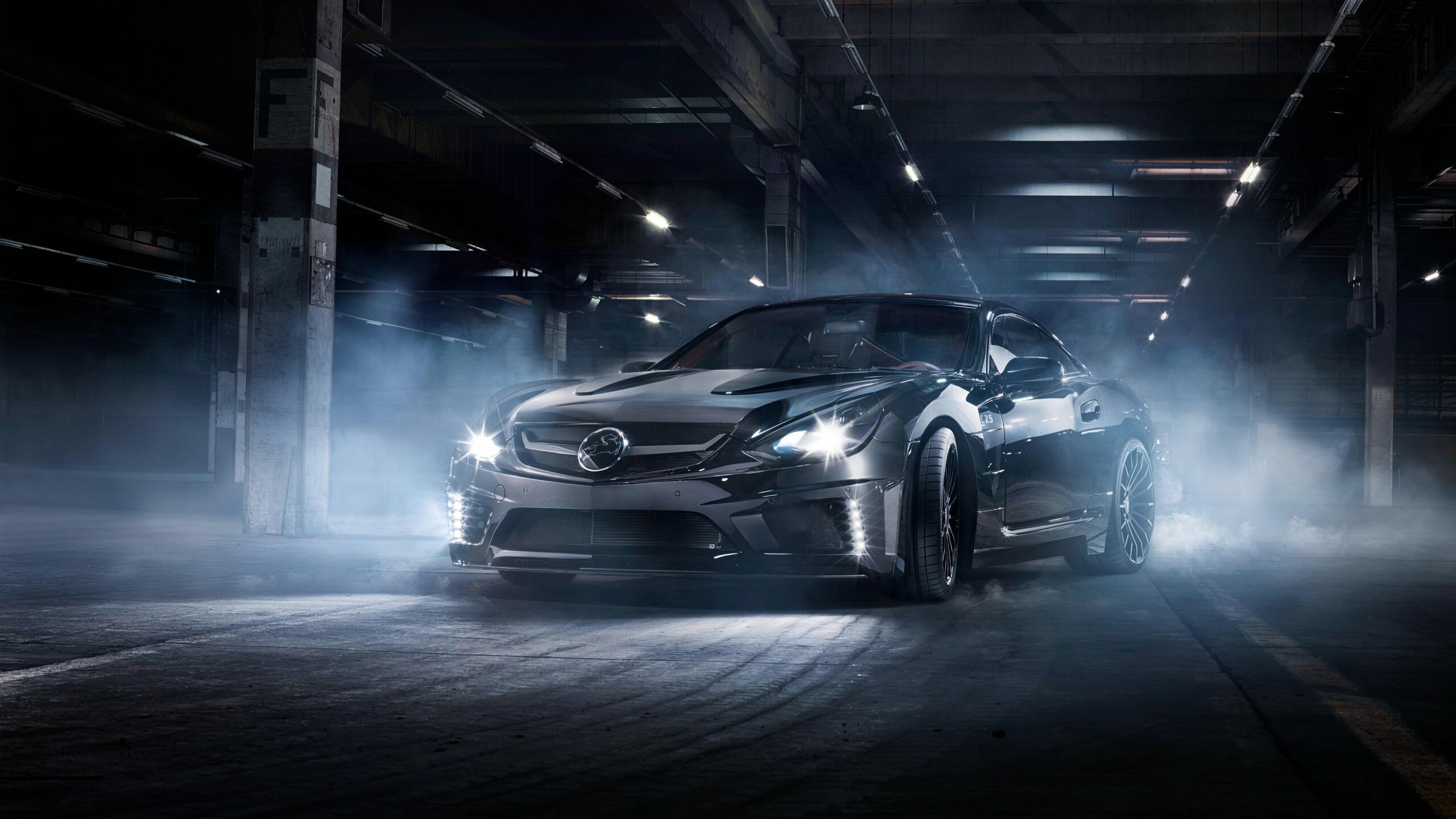 Black widebody Mercedes-Benz SL coupe, Foggy industrial garage, Multi-spoke alloy wheels Black widebody Mercedes-Benz SL coupe, Foggy industrial garage, Multi-spoke alloy wheels — 2560×1440 HD wallpaper