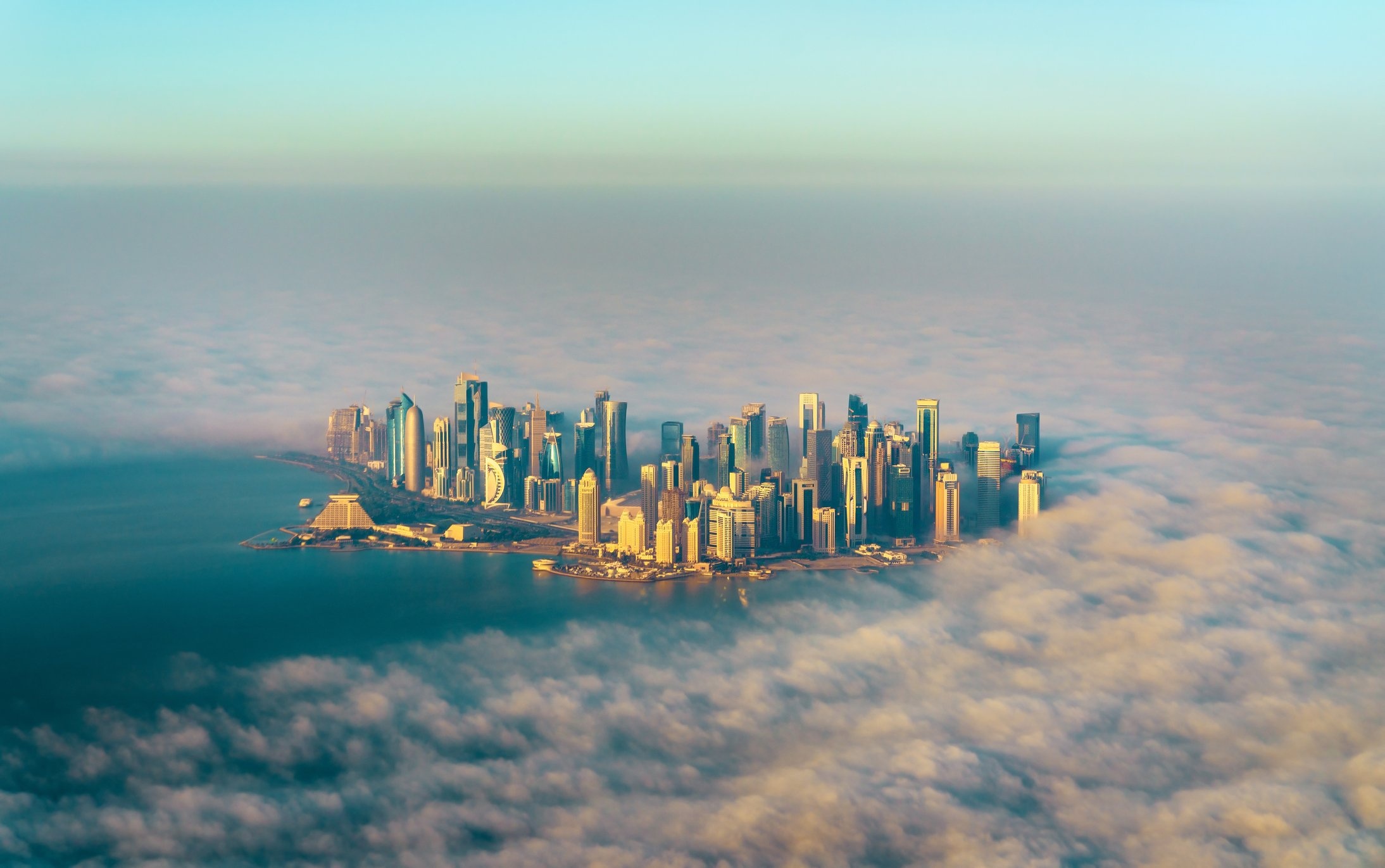 Doha West Bay skyline, Fog surrounding skyscrapers, Aerial Persian Gulf view Doha West Bay skyline, Fog surrounding skyscrapers, Aerial Persian Gulf view — 2188×1371 HD wallpaper