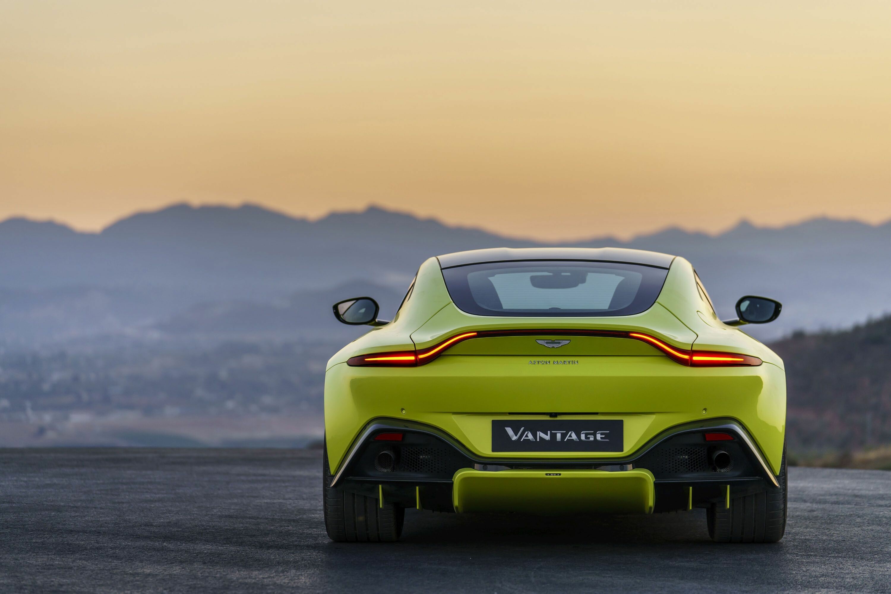 Aston Martin Vantage, Lime green coupe rear, Mountain sunset horizon Aston Martin Vantage, Lime green coupe rear, Mountain sunset horizon — 3000×2000 HD wallpaper