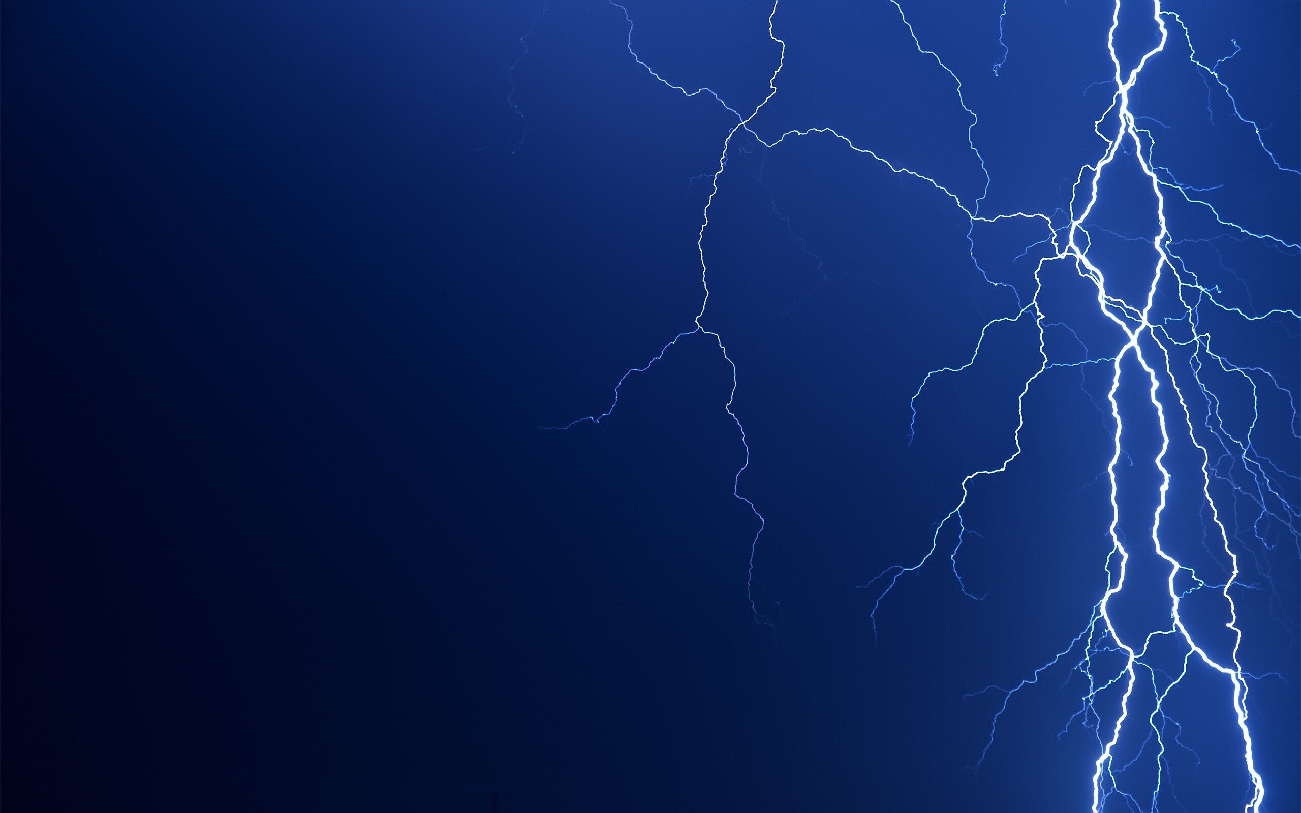 Forked lightning bolts, Dark blue night sky, Branching electric discharge Forked lightning bolts, Dark blue night sky, Branching electric discharge — 2560×1600 HD wallpaper