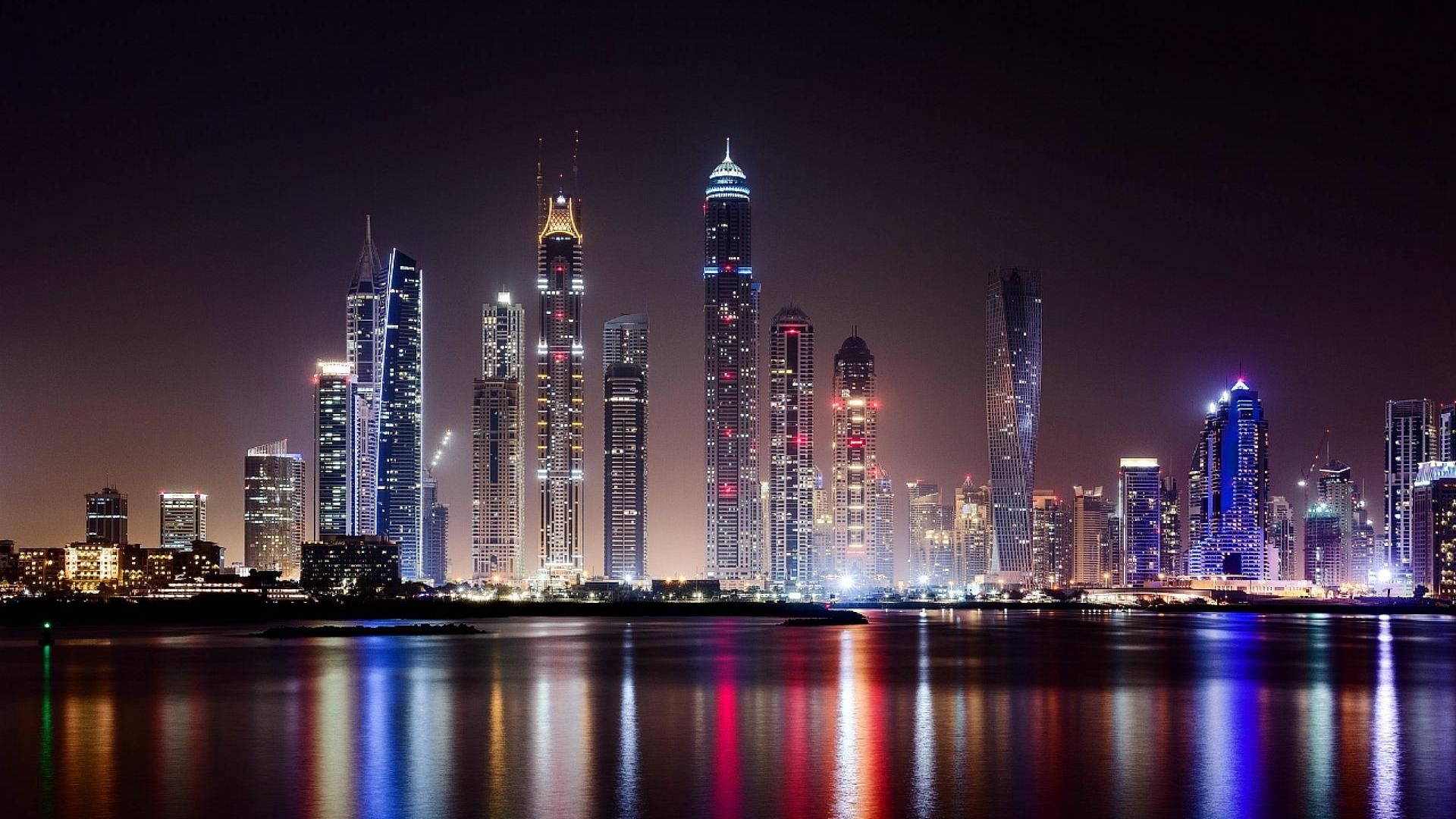 Dubai Marina night, Twisted Cayan Tower, Harbor light reflections Dubai Marina night, Twisted Cayan Tower, Harbor light reflections — 1920×1080 HD wallpaper