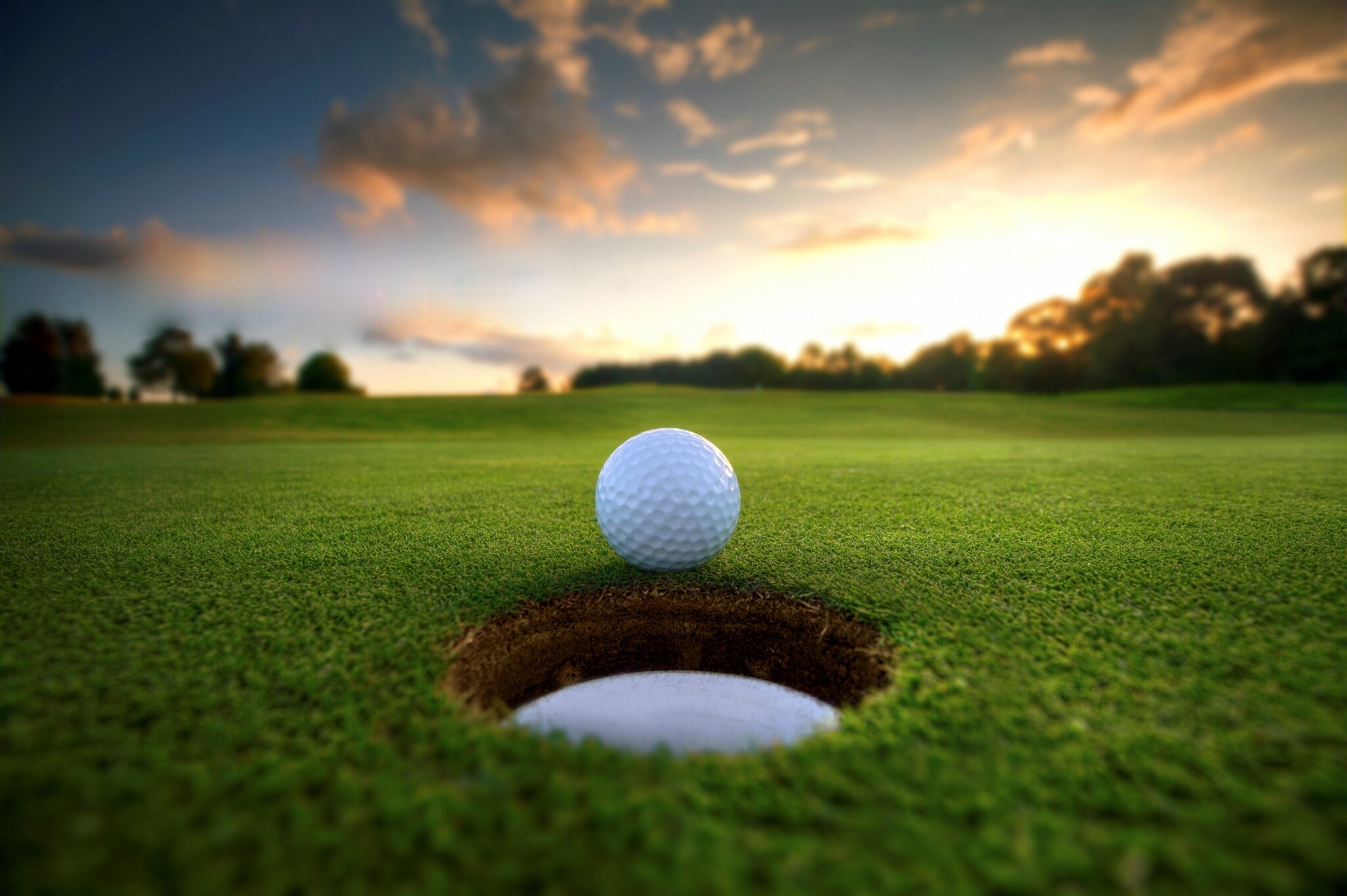 Golf ball near hole, Putting green grass, Sunset cloudy sky Golf ball near hole, Putting green grass, Sunset cloudy sky — 2048×1364 HD wallpaper