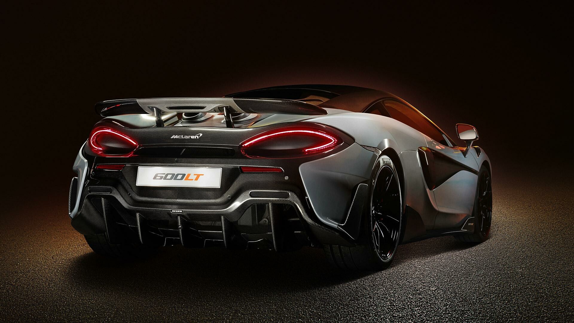 McLaren 600LT, Rear exhaust diffuser, Dark studio lighting McLaren 600LT, Rear exhaust diffuser, Dark studio lighting — 1920×1080 HD wallpaper