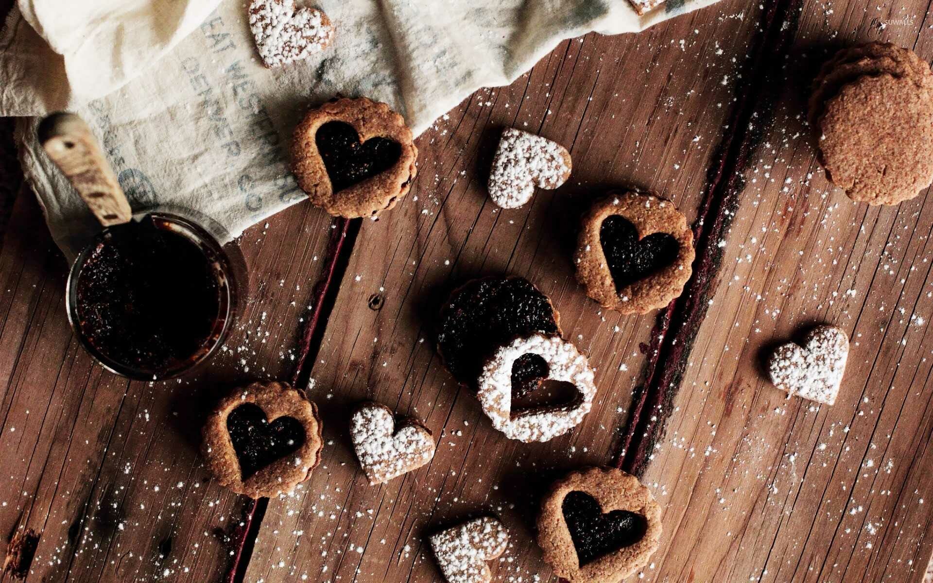 Heart-shaped Linzer cookies, Powdered sugar dusting, Rustic wooden table Heart-shaped Linzer cookies, Powdered sugar dusting, Rustic wooden table — 1920×1200 HD wallpaper