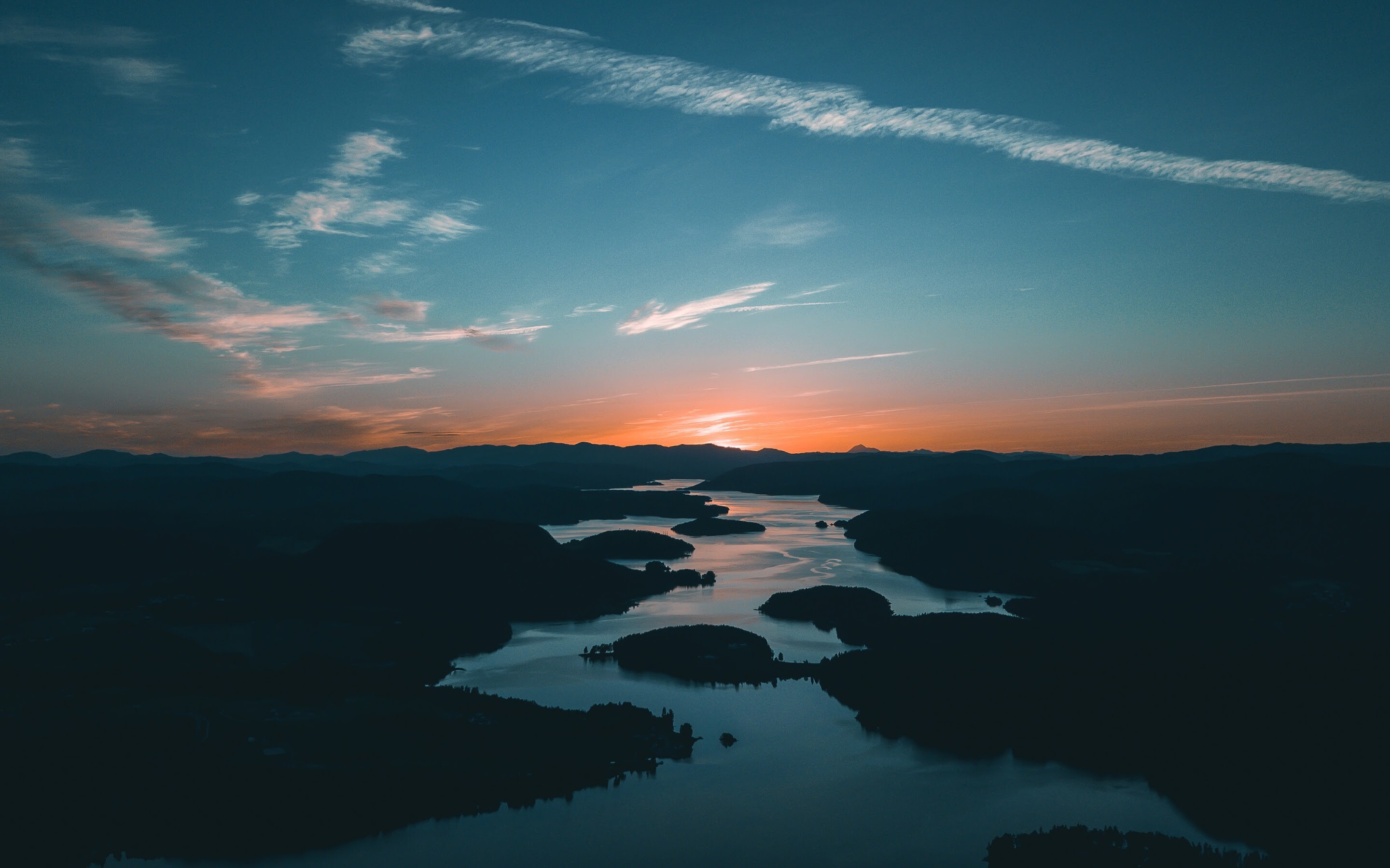 Aerial island-dotted lake, Teal twilight sky, Orange horizon glow Aerial island-dotted lake, Teal twilight sky, Orange horizon glow — 2880×1800 HD wallpaper