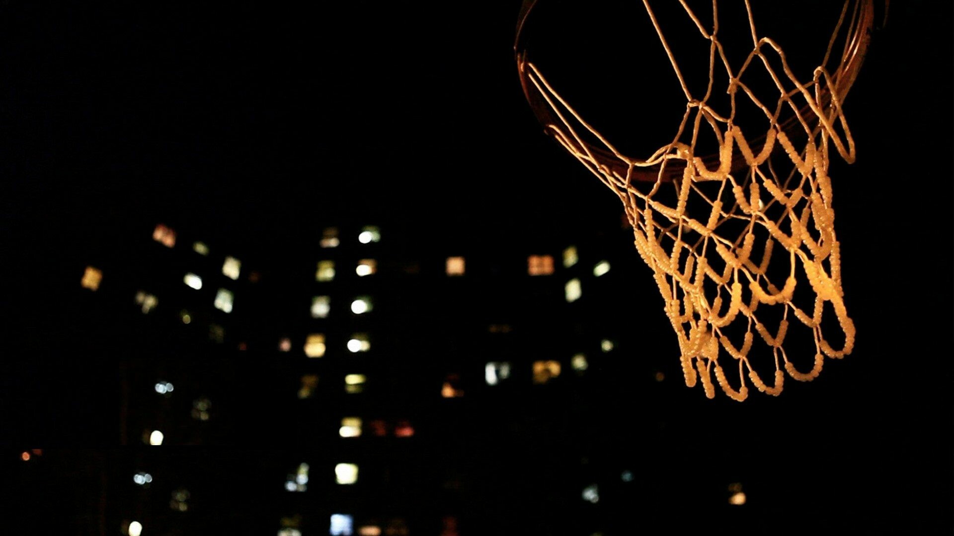 Basketball hoop net, Lit apartment building windows, Nighttime urban court Basketball hoop net, Lit apartment building windows, Nighttime urban court — 1920×1080 HD wallpaper