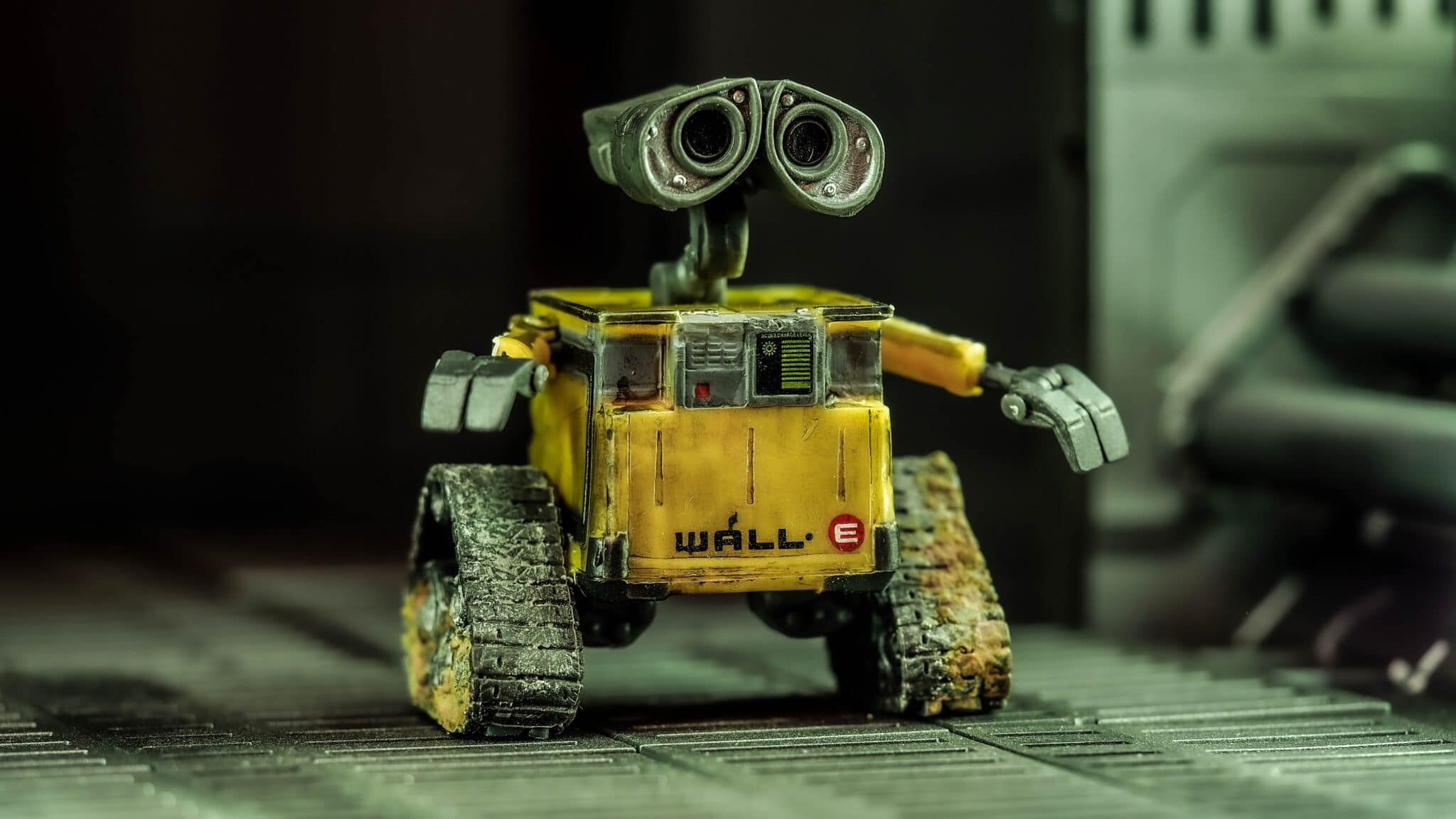 WALL-E toy figurine, Metal grating surface, Dark lighting WALL-E toy figurine, Metal grating surface, Dark lighting — 2048×1152 HD wallpaper