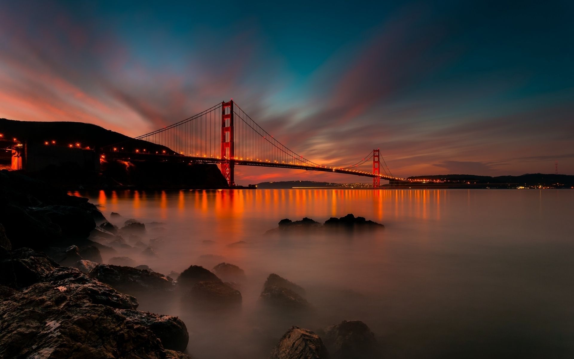 Golden Gate Bridge, Rocky shoreline bay, Sunset orange sky Golden Gate Bridge, Rocky shoreline bay, Sunset orange sky — 1920×1200 HD wallpaper