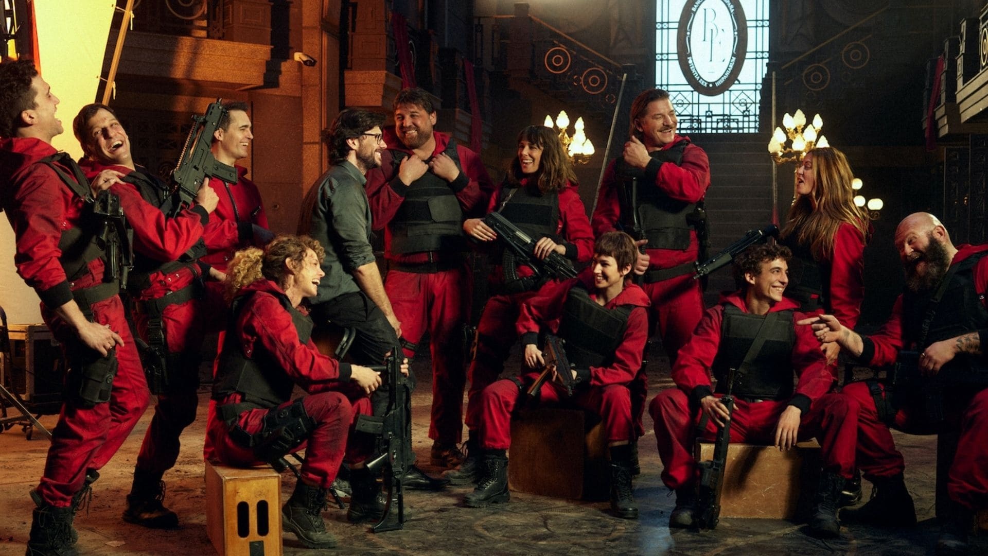 Heist crew ensemble, Red jumpsuits tactical vests, Royal Mint set, Behind-the-scenes candid Heist crew ensemble, Red jumpsuits tactical vests, Royal Mint set, Behind-the-scenes candid — 1920×1080 HD wallpaper