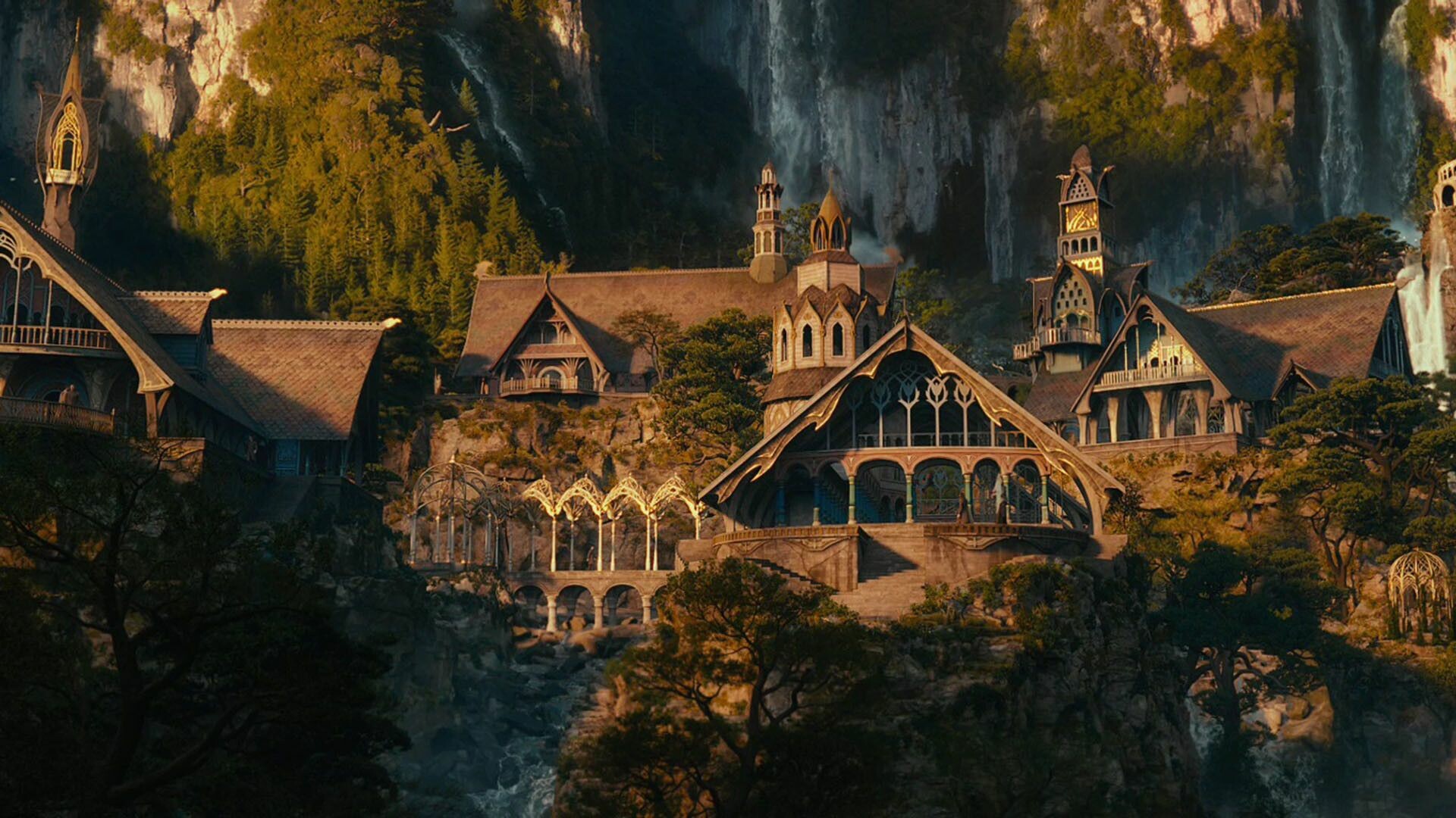 Rivendell elven city, Cliffside waterfalls, Middle-earth valley architecture Rivendell elven city, Cliffside waterfalls, Middle-earth valley architecture — 1920×1080 HD wallpaper