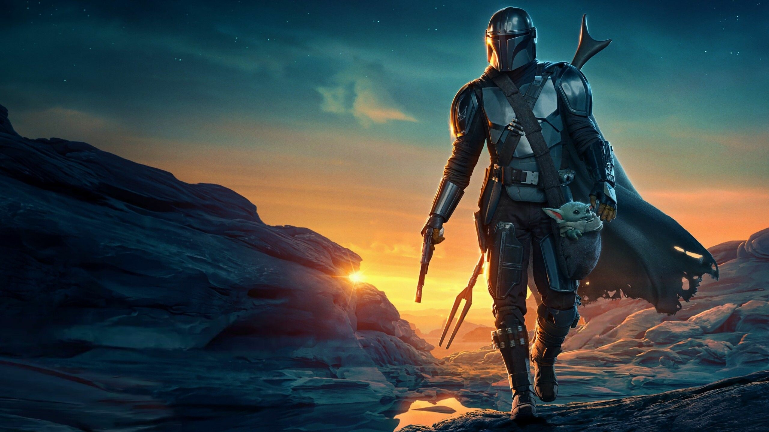 Din Djarin, Grogu in satchel, Desert canyon sunset — 2560×1440 HD wallpaper