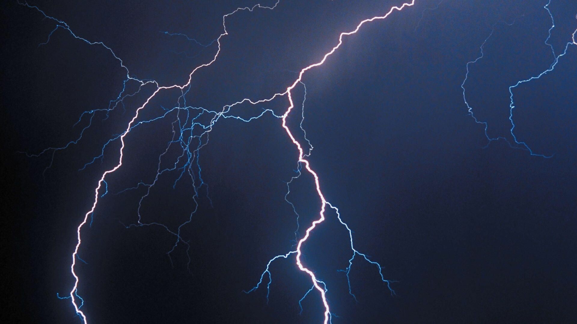 Forked lightning bolts, Dark stormy sky, Branching electrical discharge Forked lightning bolts, Dark stormy sky, Branching electrical discharge — 1920×1080 HD wallpaper