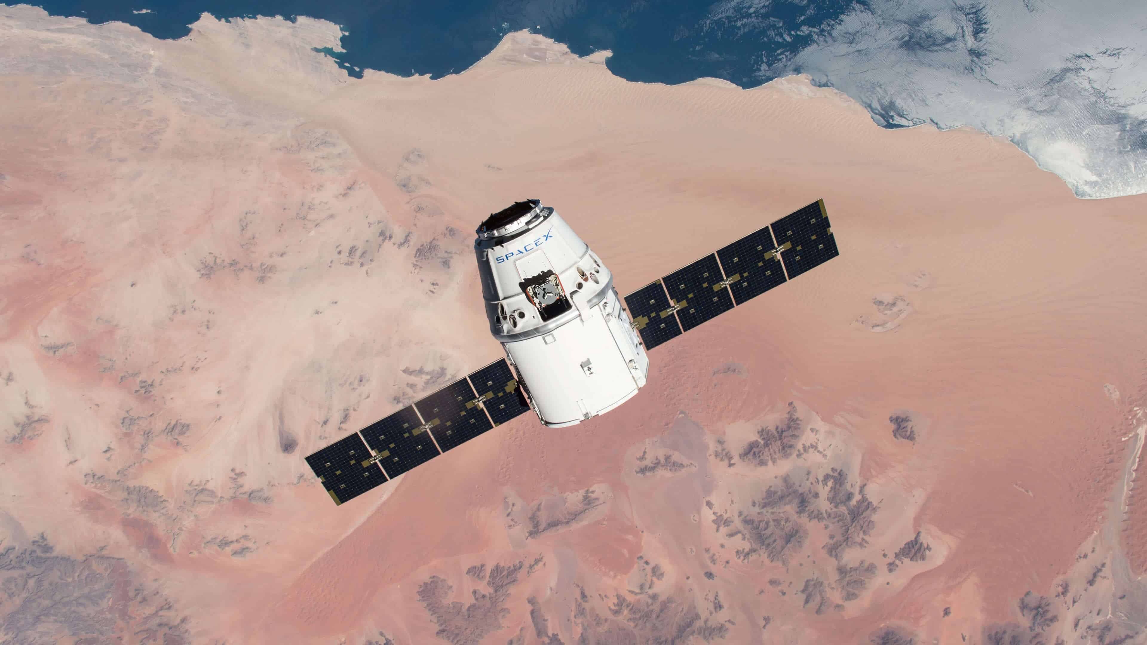 SpaceX Dragon capsule, Deployed solar arrays, Sahara from orbit SpaceX Dragon capsule, Deployed solar arrays, Sahara from orbit — 3840×2160 HD wallpaper