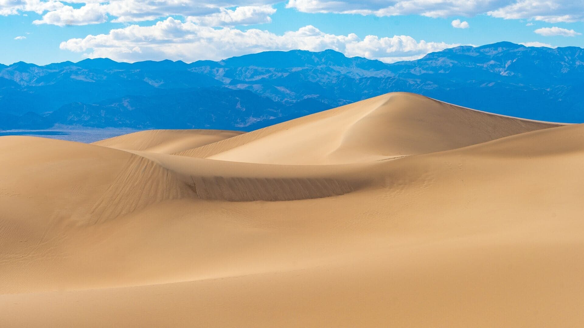 Mesquite Flat sand dunes, Blue mountain range, Cumulus cloud sky — 1920×1080 HD wallpaper