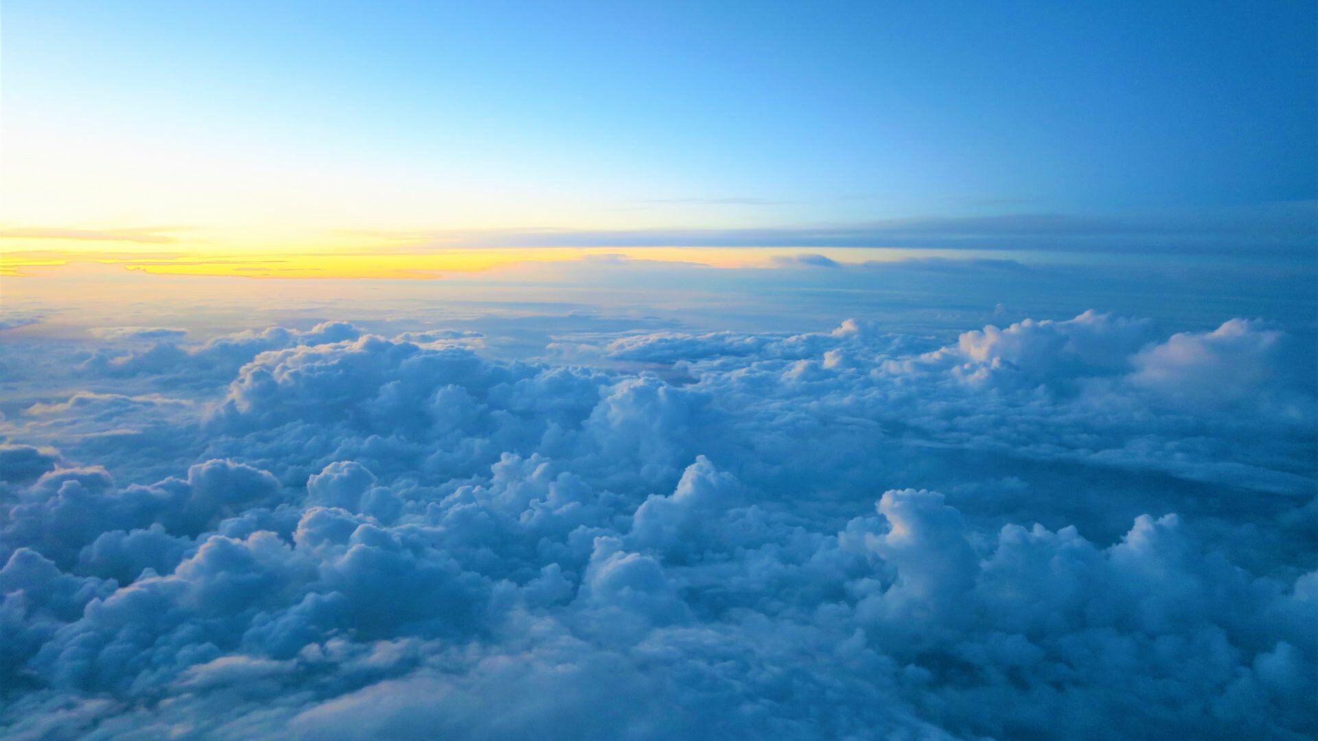 Cumulus cloud sea, Aerial sunrise horizon, Blue sky above clouds Cumulus cloud sea, Aerial sunrise horizon, Blue sky above clouds — 1920×1080 HD wallpaper
