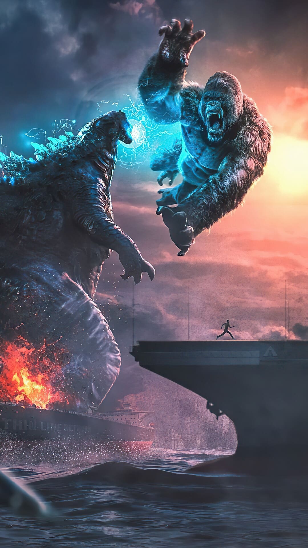 Godzilla atomic breath, King Kong leaping, Burning aircraft carrier, Running figure Godzilla atomic breath, King Kong leaping, Burning aircraft carrier, Running figure — 1080×1920 HD wallpaper