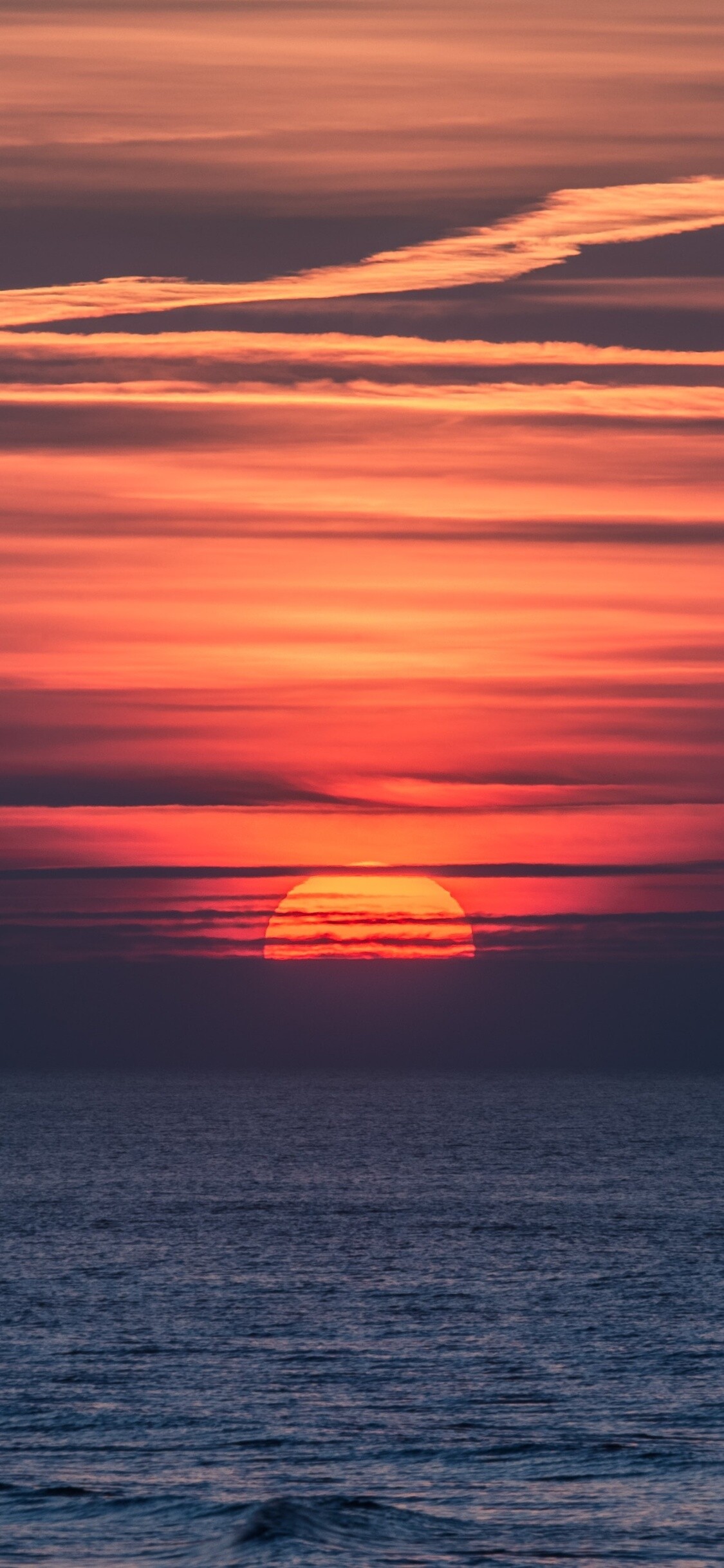 Red sun horizon, Ocean sunset seascape, Crimson orange sky Red sun horizon, Ocean sunset seascape, Crimson orange sky — 1125×2436 HD wallpaper