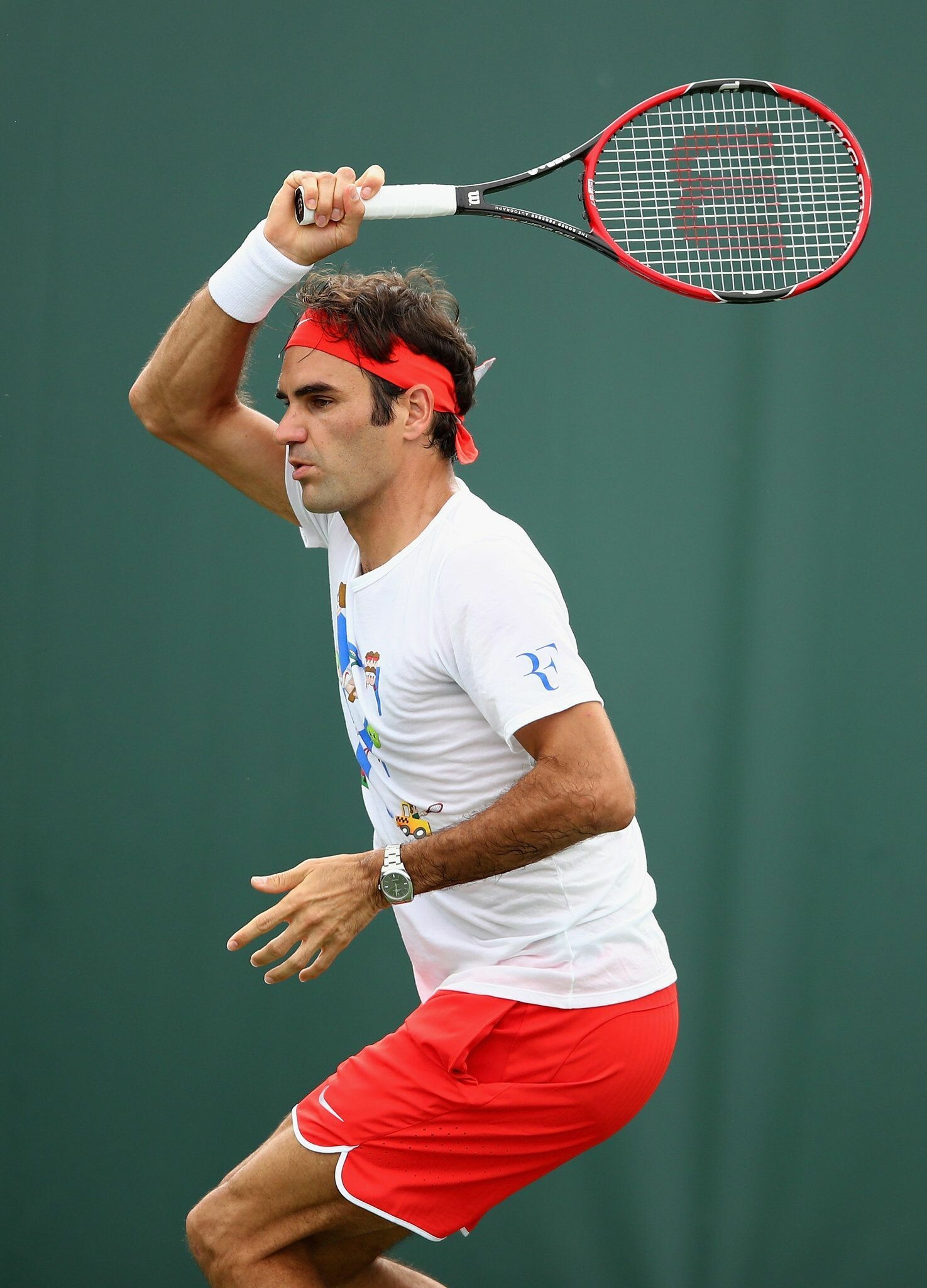 Roger Federer, Wilson tennis racket, Red headband follow-through Roger Federer, Wilson tennis racket, Red headband follow-through — 1475×2048 HD wallpaper