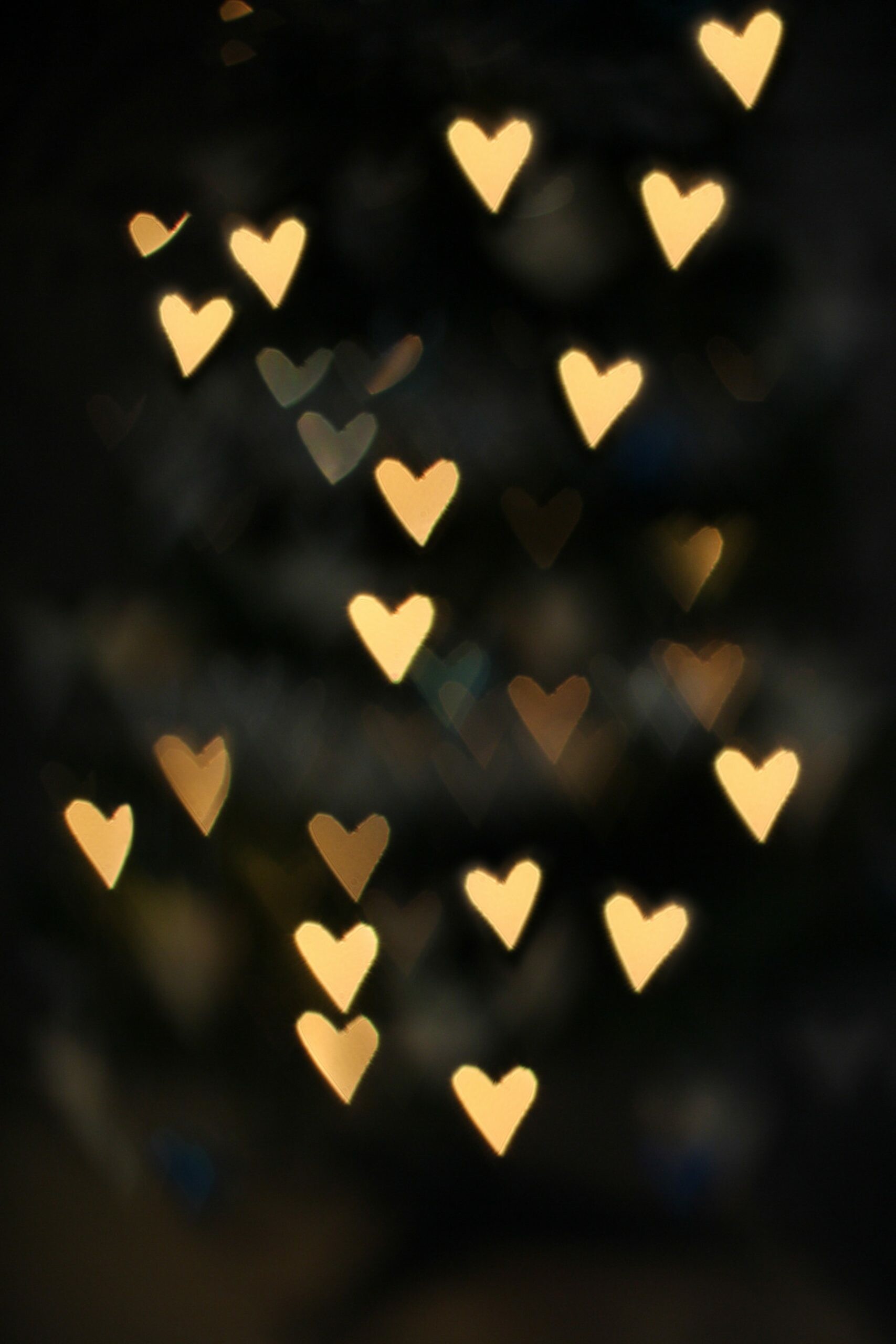 Golden heart bokeh, Blurred fairy lights, Dark night backdrop Golden heart bokeh, Blurred fairy lights, Dark night backdrop — 1707×2560 HD wallpaper
