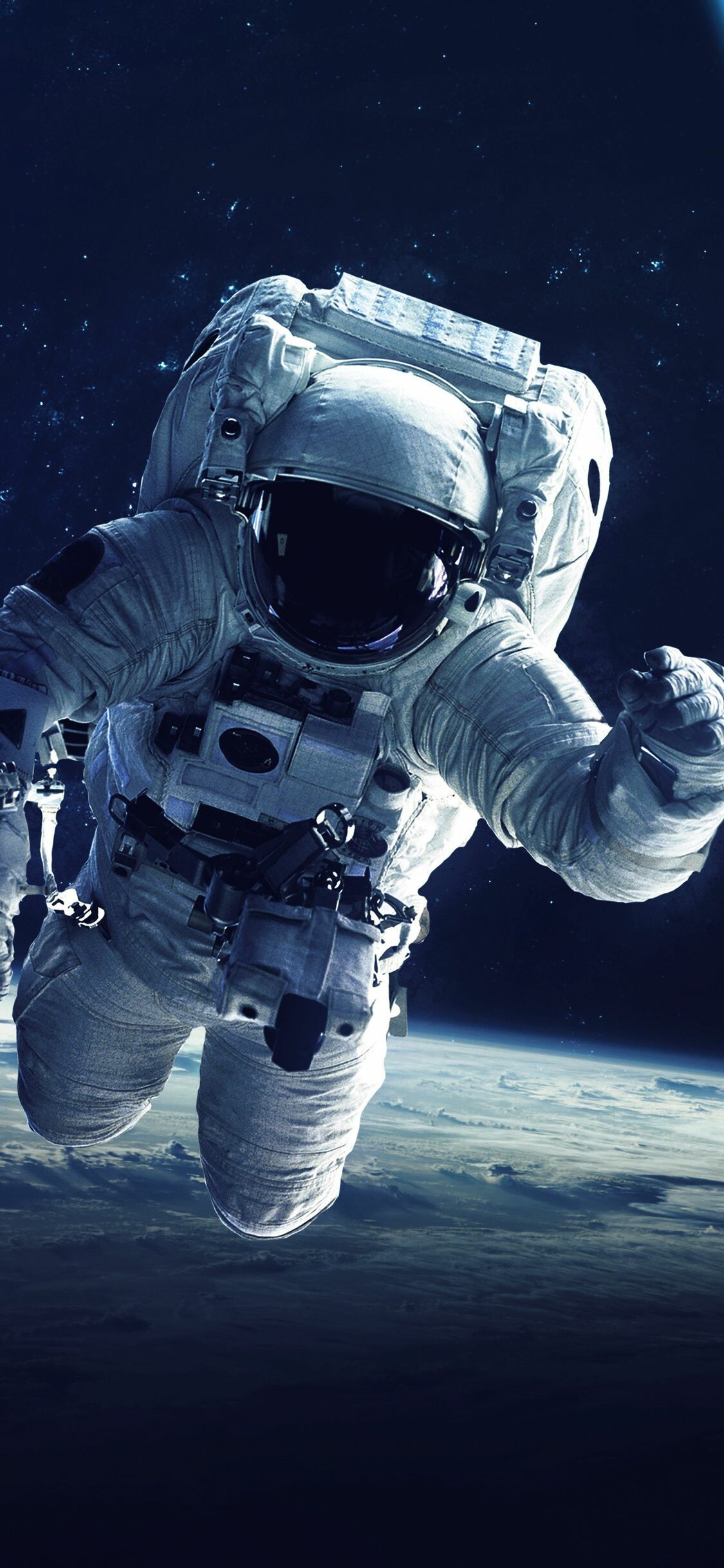 Floating astronaut, Earth horizon below, Starry black space — 1125×2436 HD wallpaper