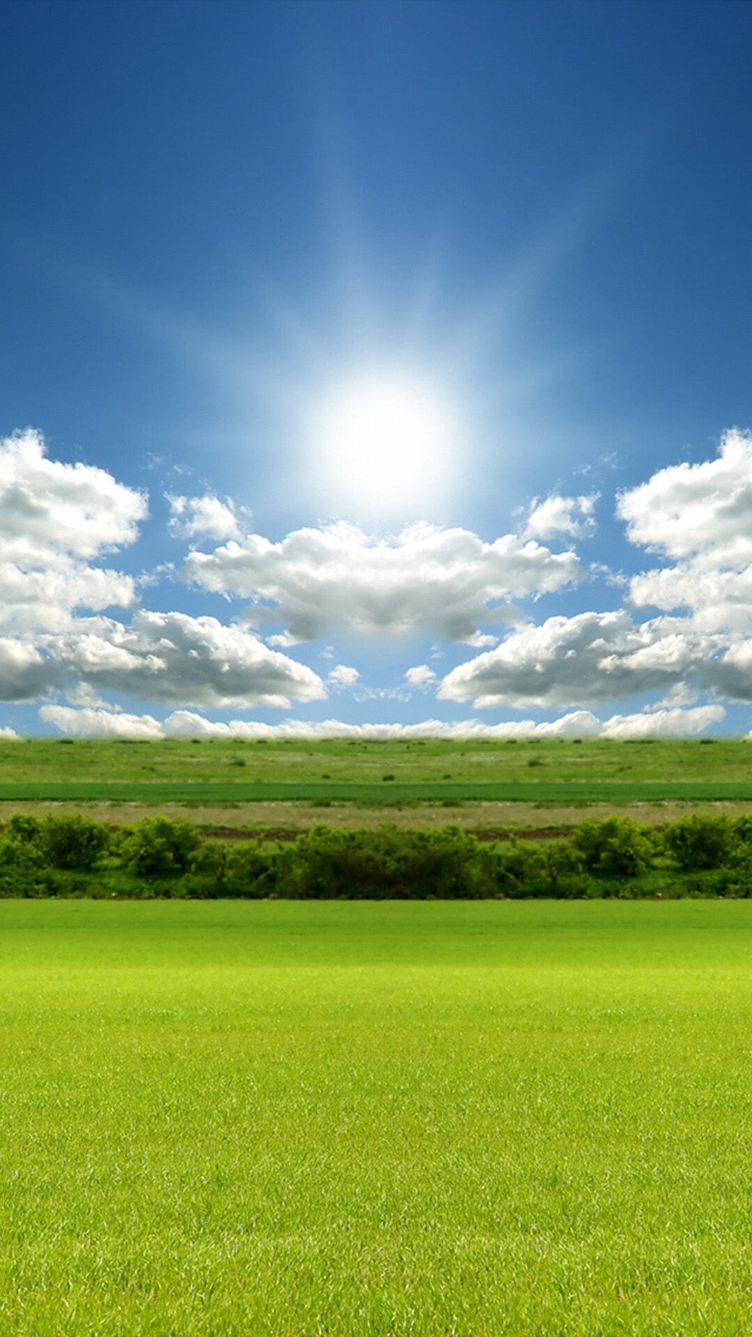 Radiant sun rays, Cumulus clouds blue sky, Green grass field Radiant sun rays, Cumulus clouds blue sky, Green grass field — 1080×1920 HD wallpaper