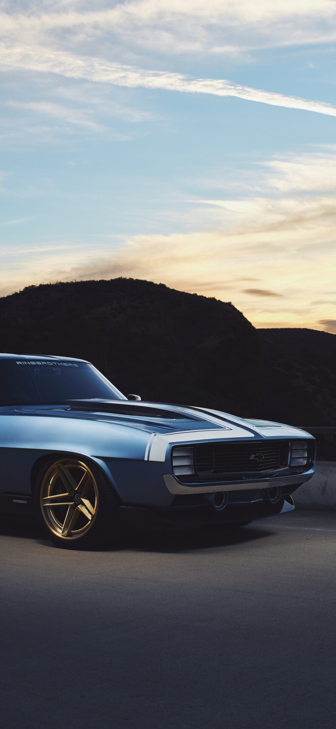 1969 Chevrolet Camaro, Gold five-spoke wheels, Sunset mountain horizon 1969 Chevrolet Camaro, Gold five-spoke wheels, Sunset mountain horizon — 1125×2436 HD wallpaper