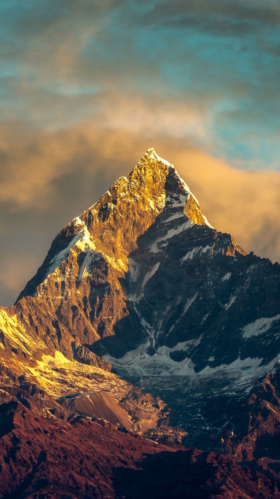 Machapuchare peak Annapurna, Golden sunset alpenglow, Snow-streaked rocky ridges Machapuchare peak Annapurna, Golden sunset alpenglow, Snow-streaked rocky ridges — 1080×1920 HD wallpaper