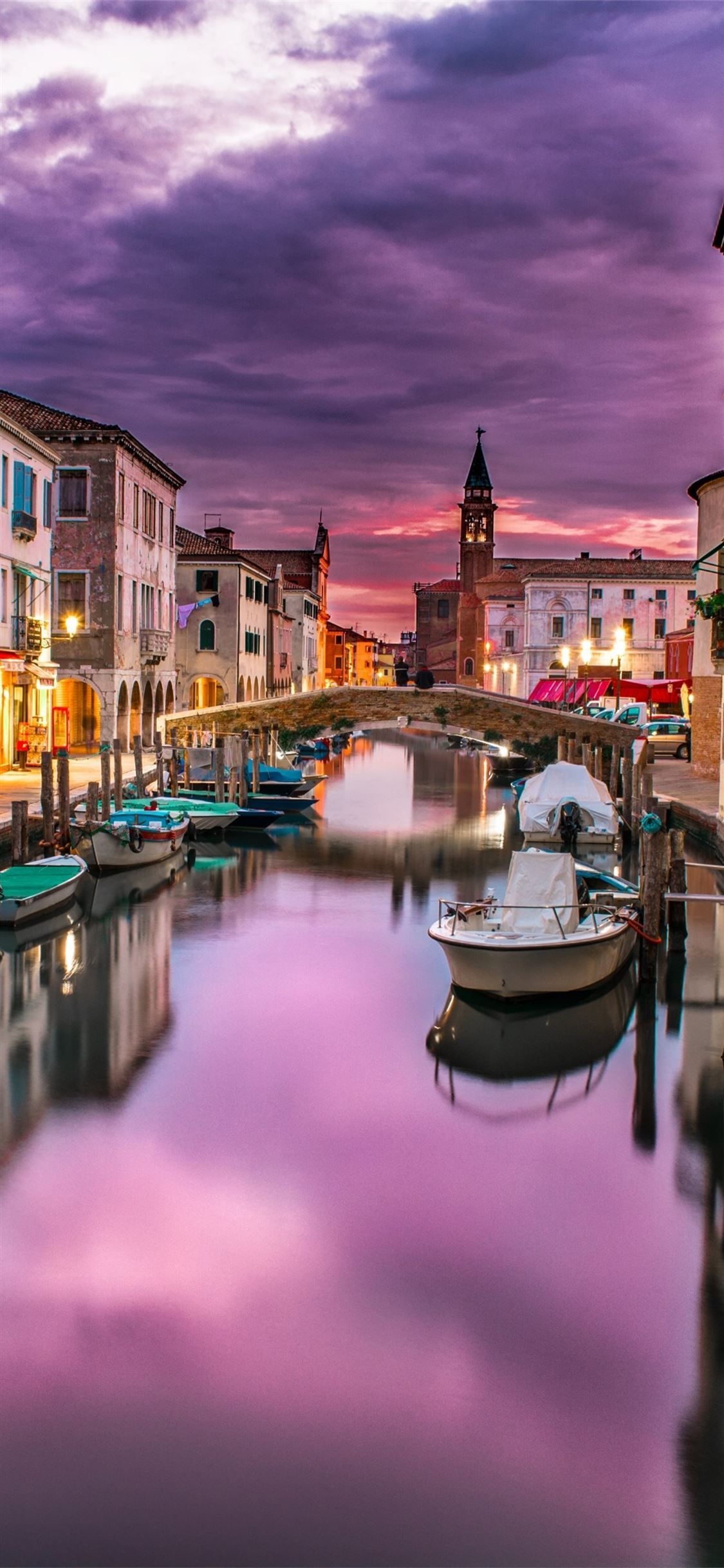Venetian canal boats, Stone footbridge, Purple twilight sky, Bell tower campanile Venetian canal boats, Stone footbridge, Purple twilight sky, Bell tower campanile — 1125×2436 HD wallpaper