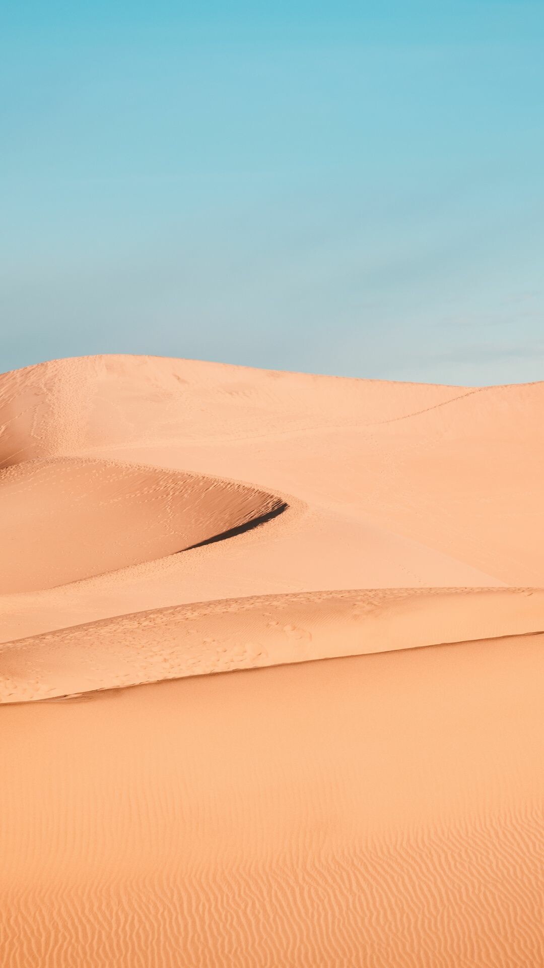 Curved sand dunes, Clear blue sky, Rippled desert sand Curved sand dunes, Clear blue sky, Rippled desert sand — 1080×1920 HD wallpaper