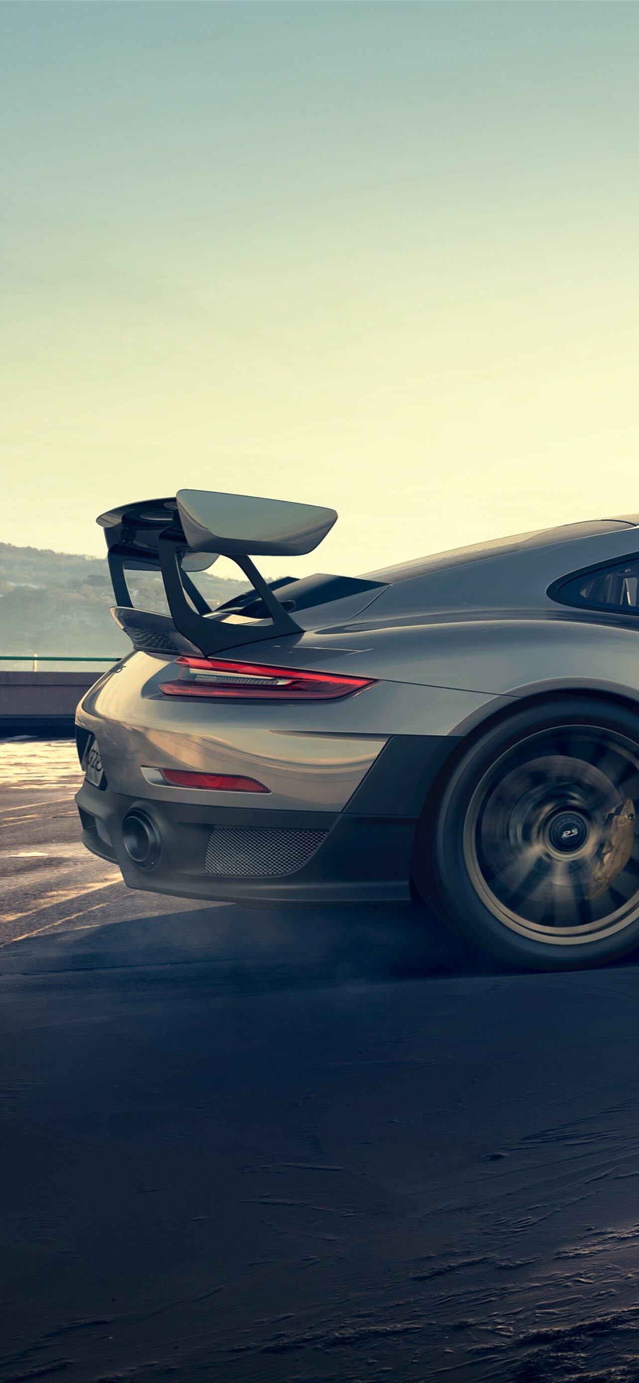 Porsche 911 GT2 RS, Silver rear quarter, Swan-neck rear wing Porsche 911 GT2 RS, Silver rear quarter, Swan-neck rear wing — 1284×2778 HD wallpaper