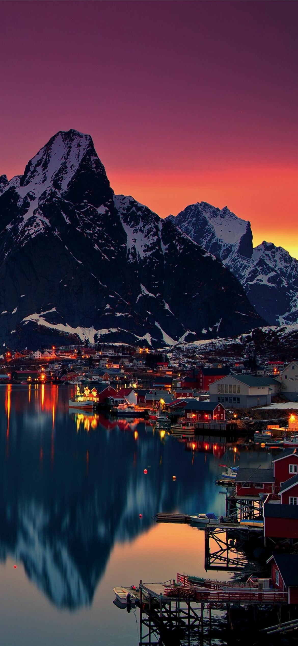 Reine Lofoten village, Snowy fjord mountains, Purple sunset reflection Reine Lofoten village, Snowy fjord mountains, Purple sunset reflection — 1170×2532 HD wallpaper