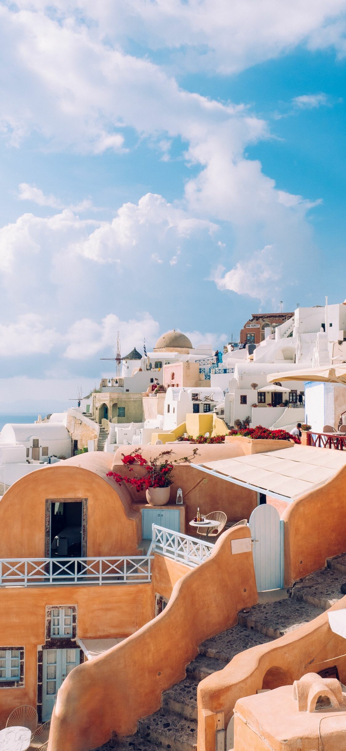 Oia Santorini village, Whitewashed cliffside houses, Pink bougainvillea terrace, Aegean Sea view Oia Santorini village, Whitewashed cliffside houses, Pink bougainvillea terrace, Aegean Sea view — 1125×2436 HD wallpaper
