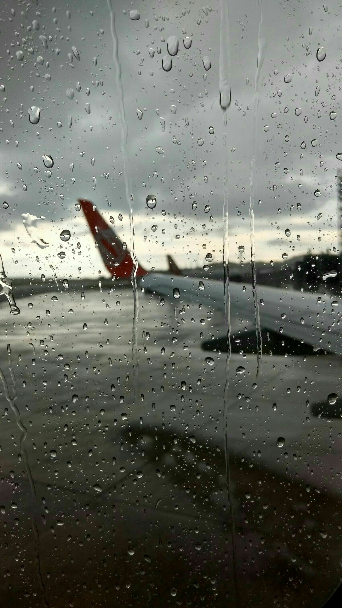 Raindrops on window, Airplane wing tarmac, Overcast grey sky — 1200×2133 HD wallpaper
