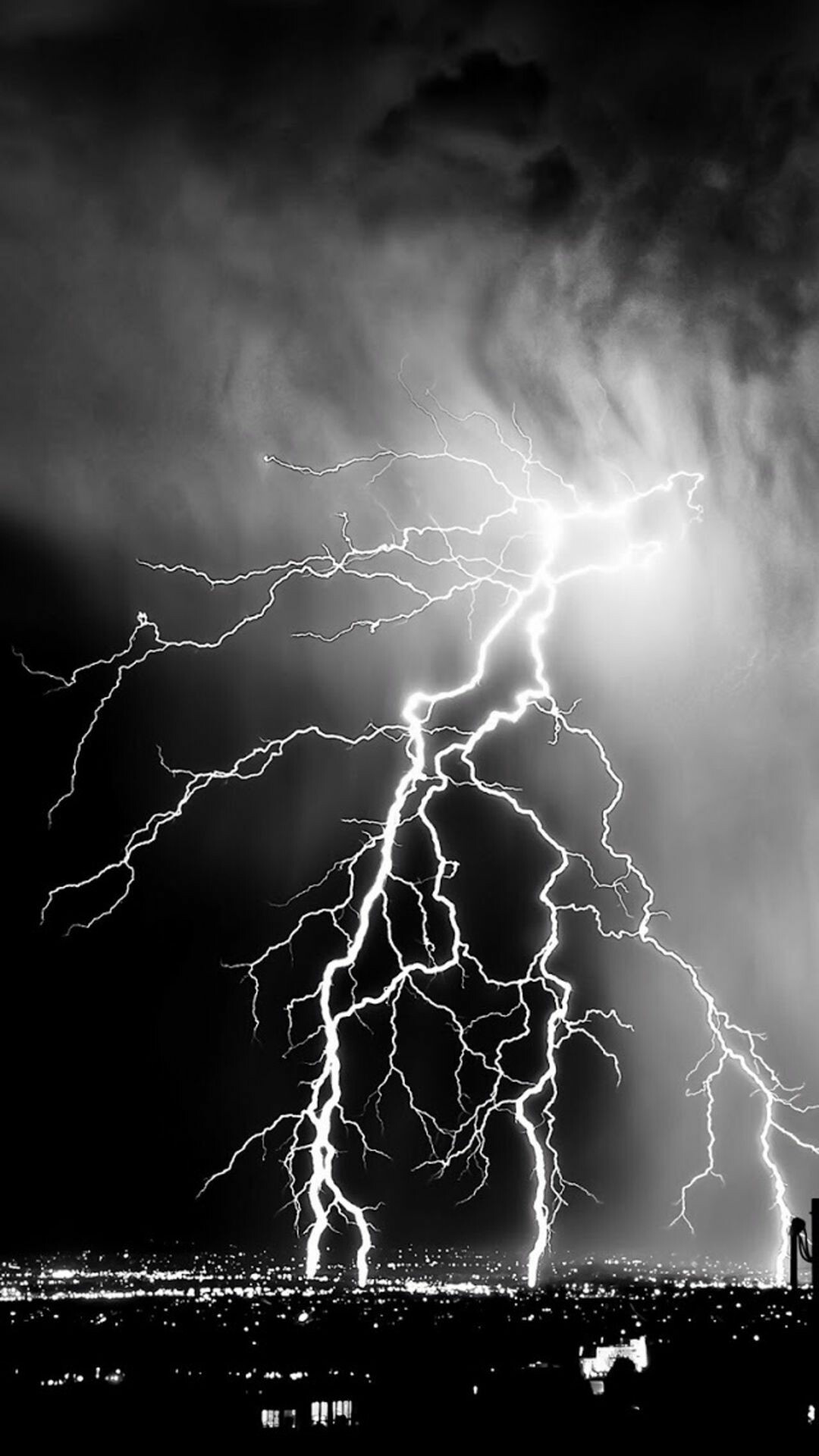 Forked lightning bolts, Stormy night sky, Illuminated city skyline Forked lightning bolts, Stormy night sky, Illuminated city skyline — 1080×1920 HD wallpaper