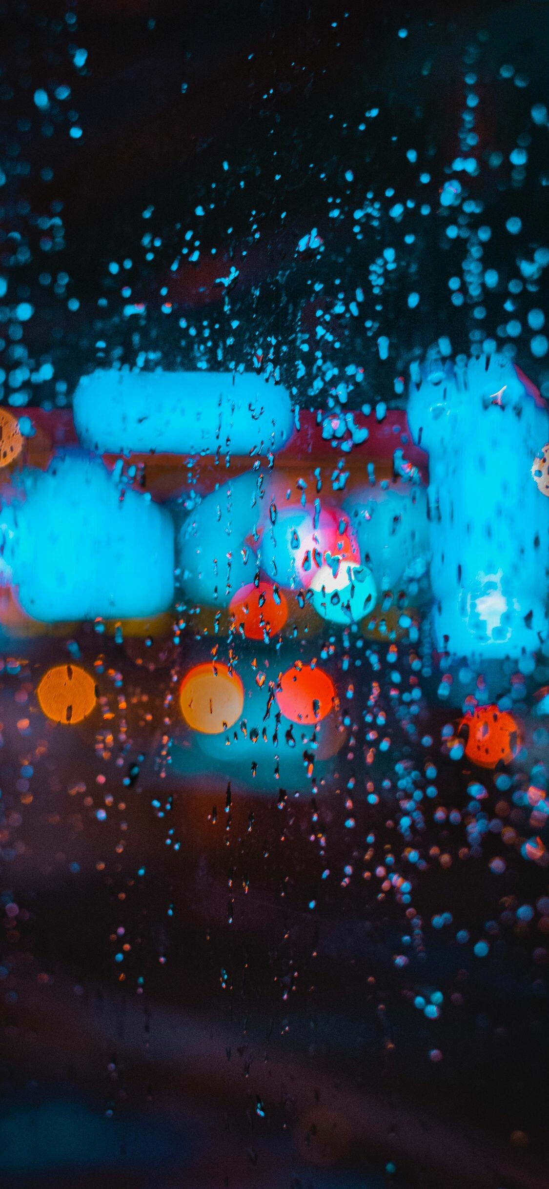 Raindrops on glass, Blurred city bokeh lights, Cyan orange night street Raindrops on glass, Blurred city bokeh lights, Cyan orange night street — 1125×2436 HD wallpaper