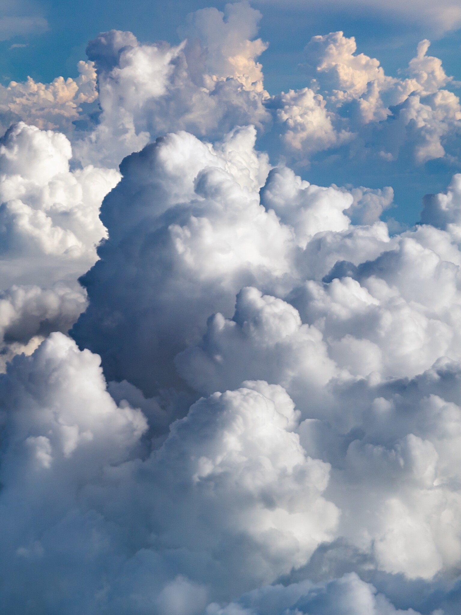Towering cumulus clouds, Aerial cloudscape view, Blue sky gaps Towering cumulus clouds, Aerial cloudscape view, Blue sky gaps — 1536×2048 HD wallpaper