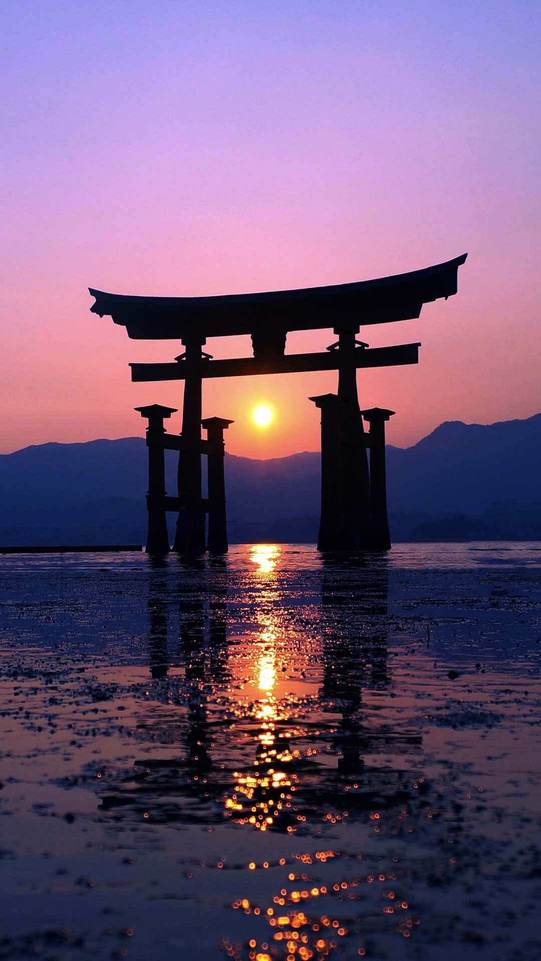 Itsukushima Shrine torii gate, Sun over tidal water, Wet-sand mirror reflection, Purple pink twilight Itsukushima Shrine torii gate, Sun over tidal water, Wet-sand mirror reflection, Purple pink twilight — 1080×1920 HD wallpaper