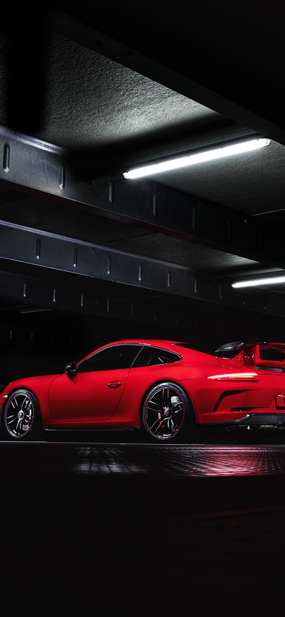 Red 991 GT3, Side profile view, Dark parking garage — 1125×2436 HD wallpaper