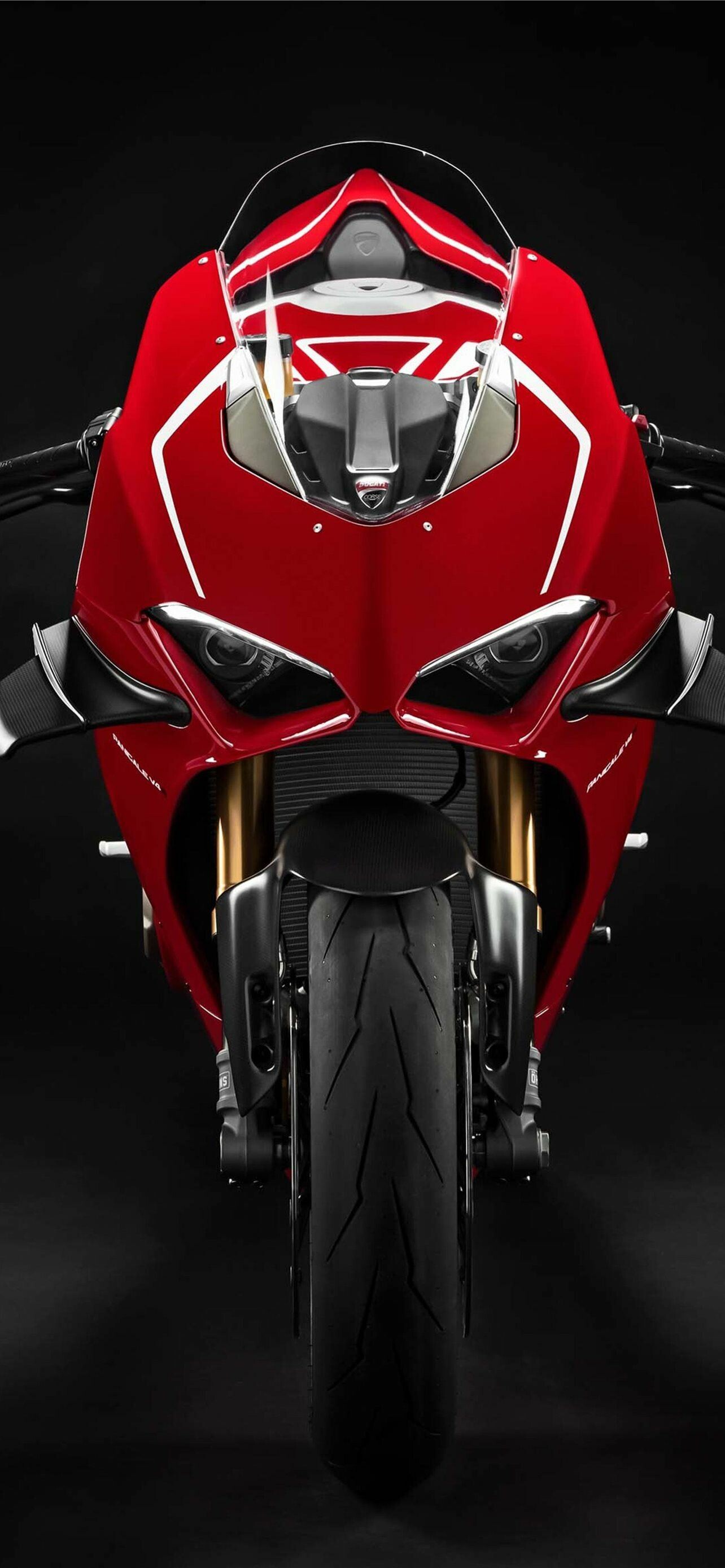 Ducati Panigale V4, Red superbike front, Dark studio backdrop Ducati Panigale V4, Red superbike front, Dark studio backdrop — 1284×2778 HD wallpaper