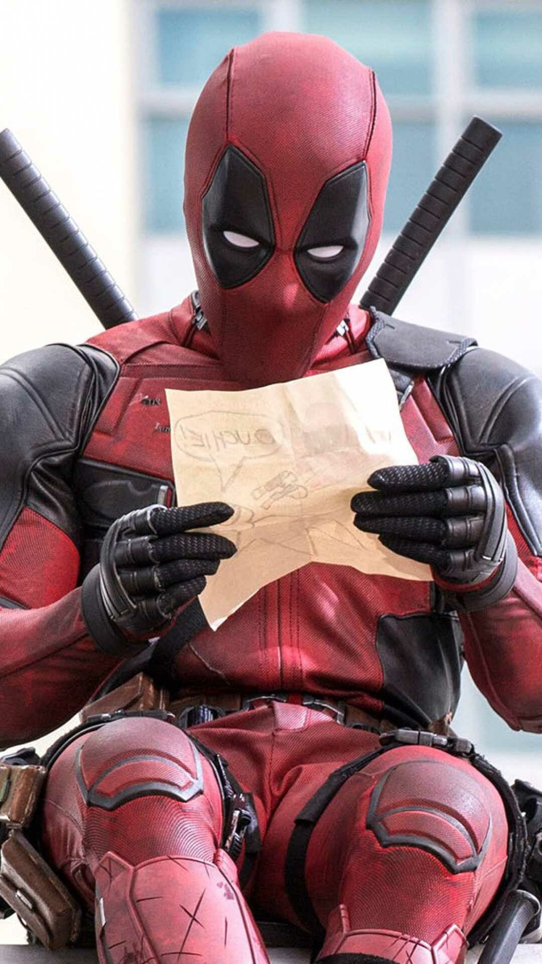Deadpool reading crayon drawing, Seated holding note, Movie scene still Deadpool reading crayon drawing, Seated holding note, Movie scene still — 1080×1920 HD wallpaper