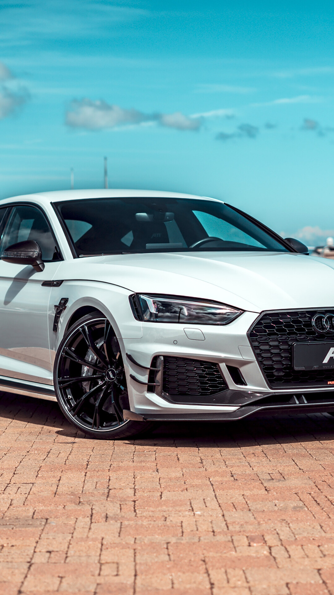 White ABT Audi RS5, Black alloy wheels, Brick pavement blue sky White ABT Audi RS5, Black alloy wheels, Brick pavement blue sky — 1080×1920 HD wallpaper