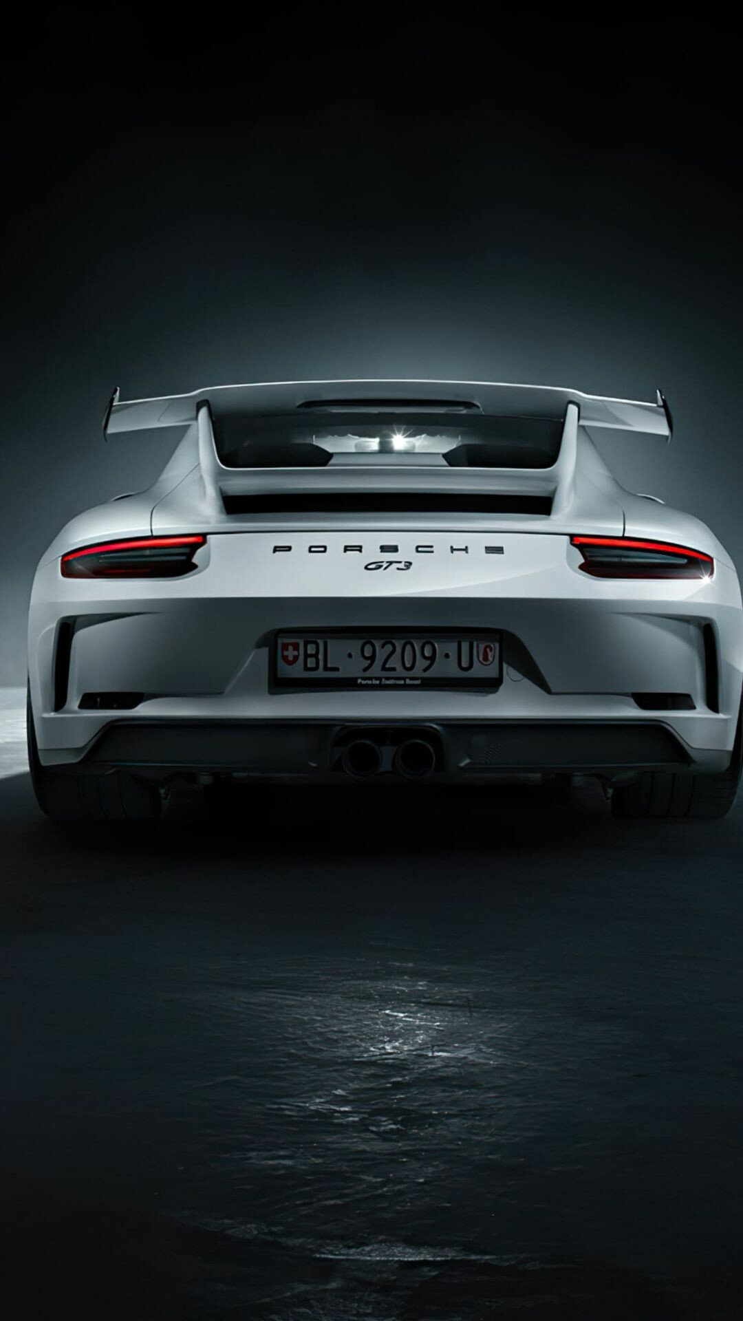 White 911 GT3, Fixed rear wing, Dark studio backdrop White 911 GT3, Fixed rear wing, Dark studio backdrop — 1080×1920 HD wallpaper