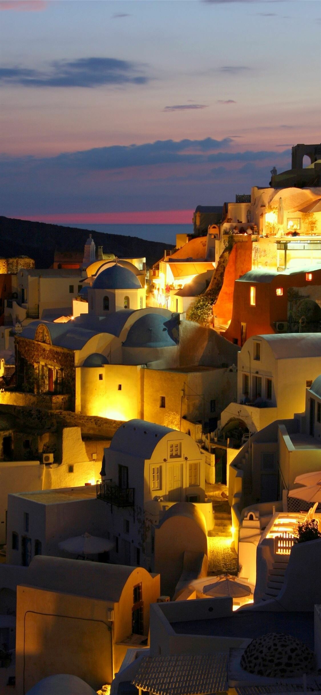 Oia Santorini village, Blue-domed churches, Twilight sunset sky Oia Santorini village, Blue-domed churches, Twilight sunset sky — 1125×2436 HD wallpaper