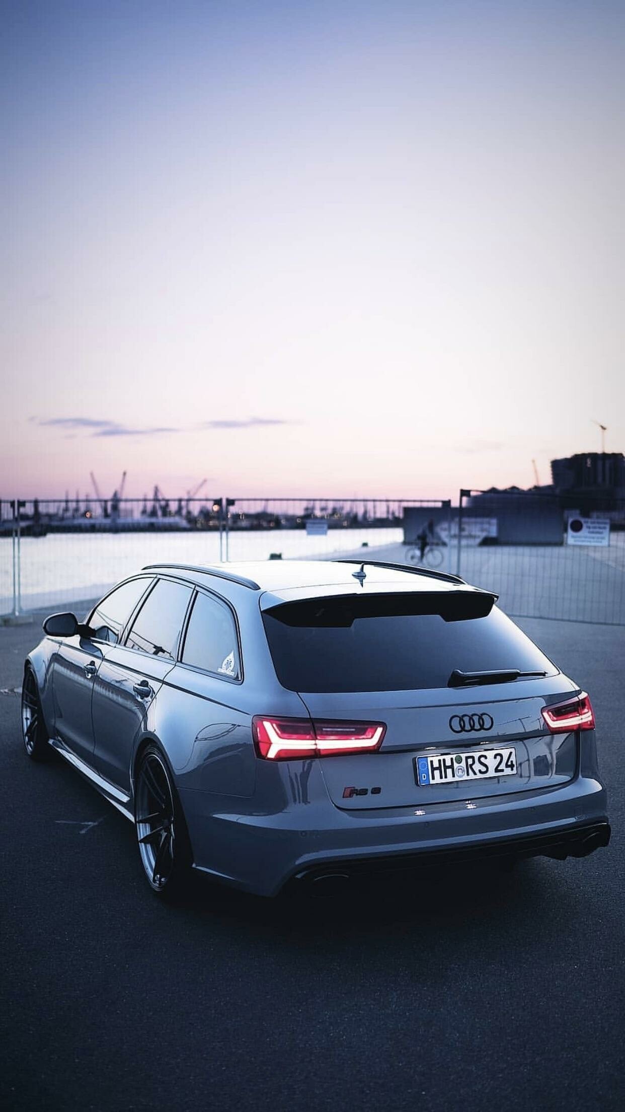 Nardo gray RS6 Avant, Harbor waterfront dusk, LED taillights lit Nardo gray RS6 Avant, Harbor waterfront dusk, LED taillights lit — 1242×2208 HD wallpaper