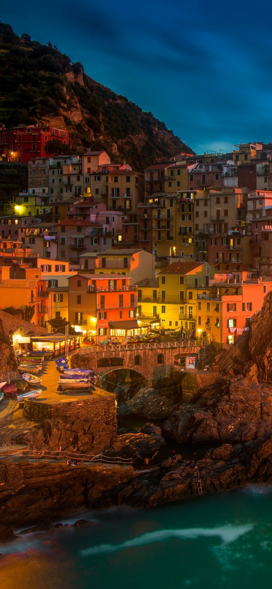 Manarola Cinque Terre, Blue hour village lights, Rocky harbor boats Manarola Cinque Terre, Blue hour village lights, Rocky harbor boats — 1080×2340 HD wallpaper