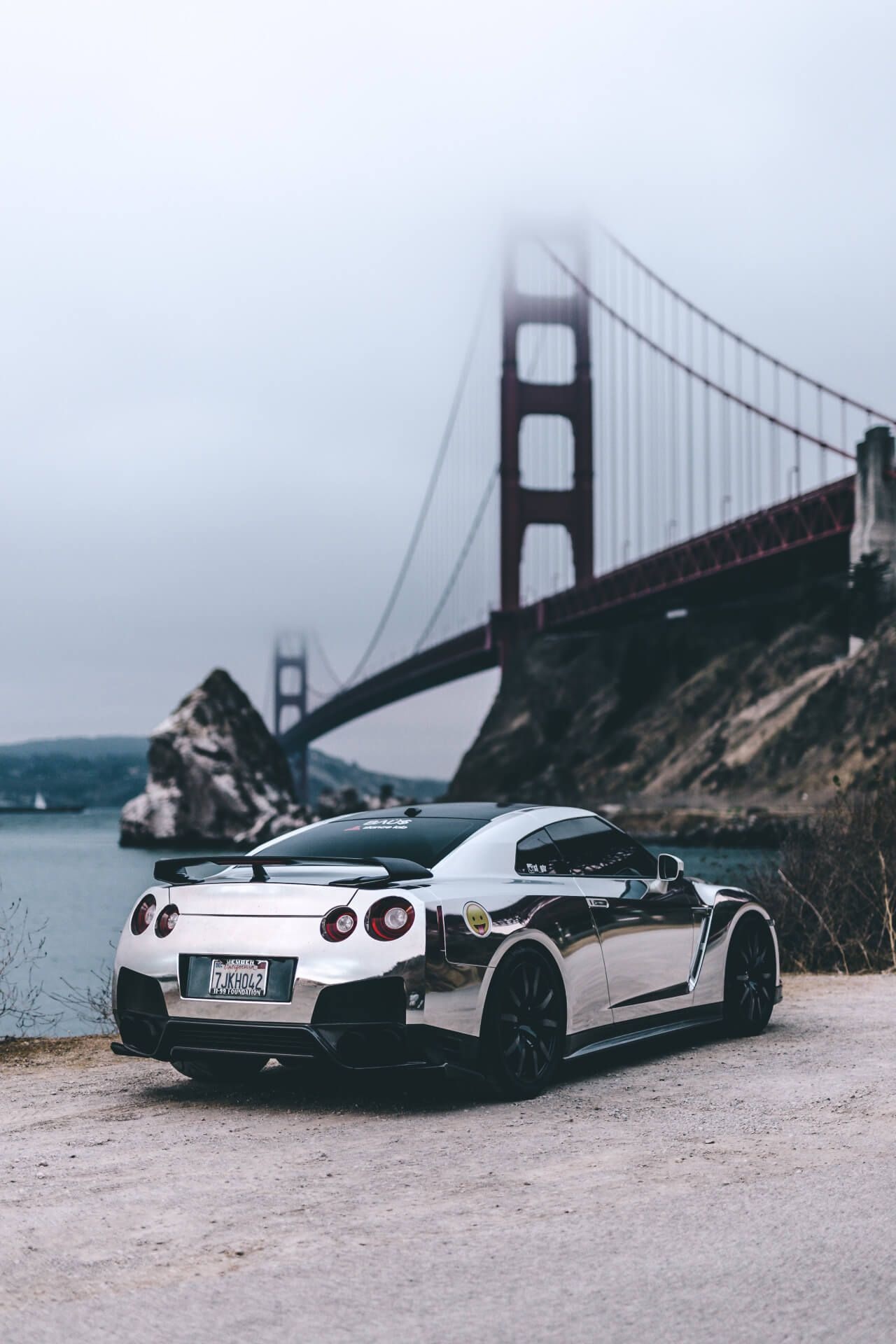 Nissan GT-R R35, Golden Gate Bridge, Chrome mirror wrap, Foggy bay backdrop — 1280×1920 HD wallpaper