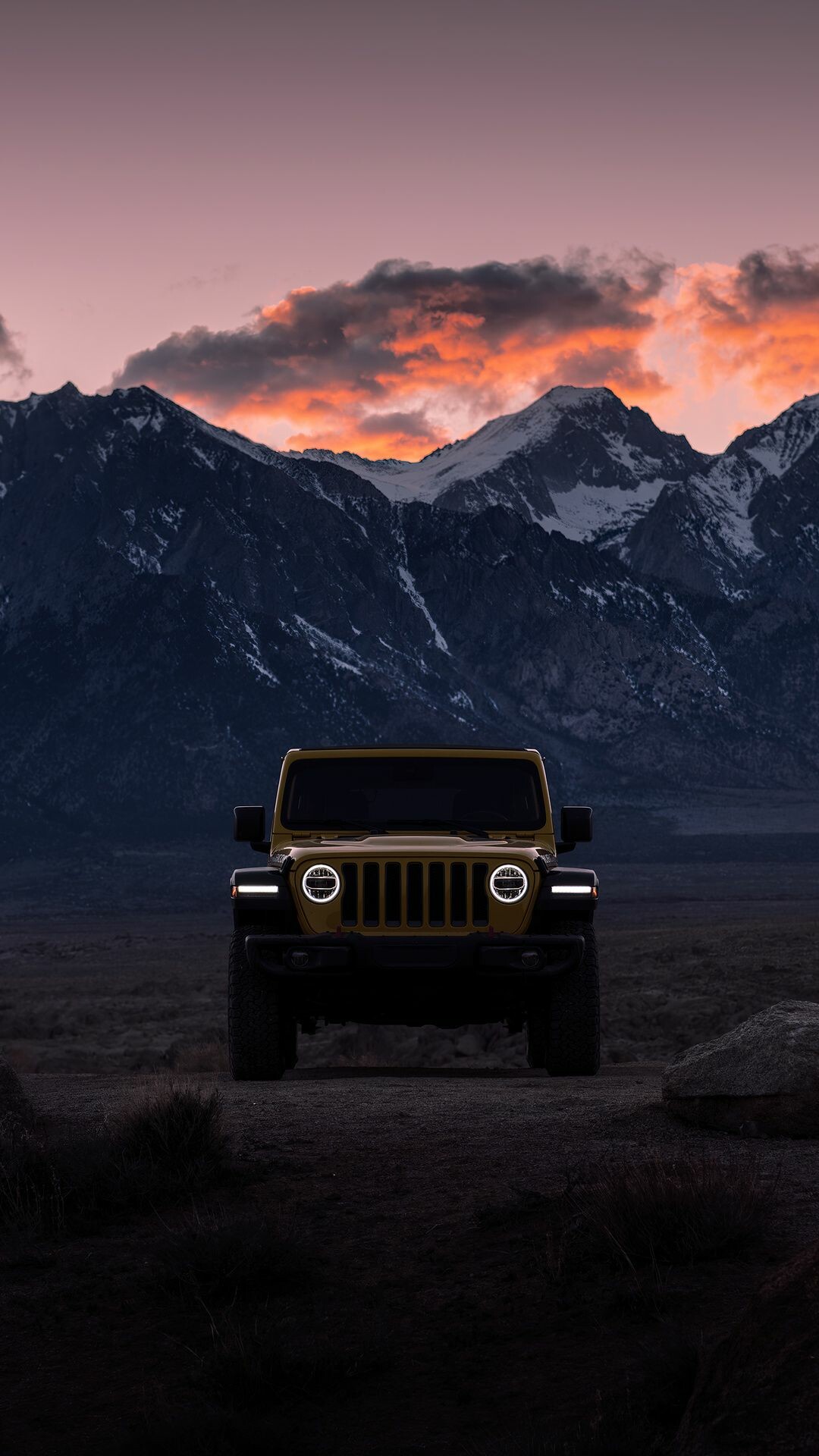 Yellow Jeep Wrangler, Snow-capped mountain range, Sunset cloudy sky — 1080×1920 HD wallpaper
