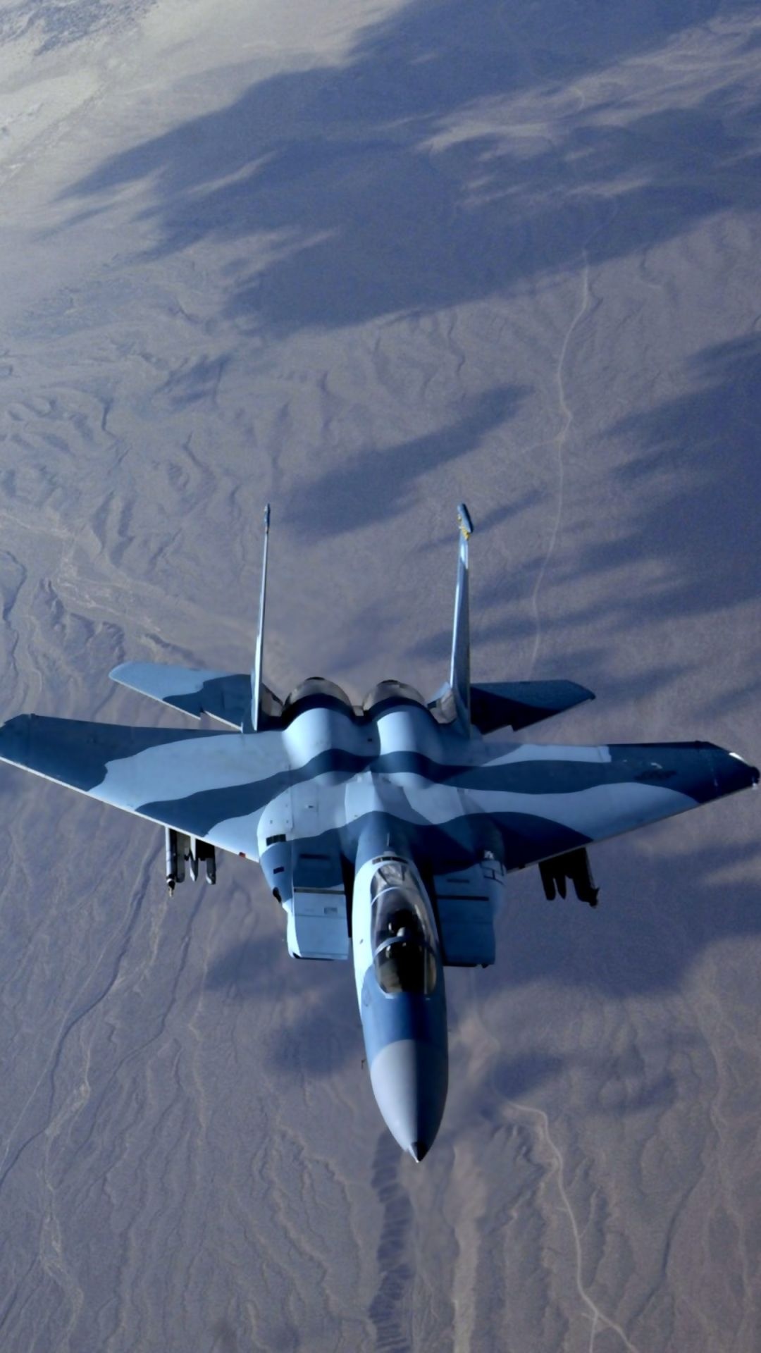 F-15 Eagle, Blue camouflage livery, Desert terrain below F-15 Eagle, Blue camouflage livery, Desert terrain below — 1080×1920 HD wallpaper