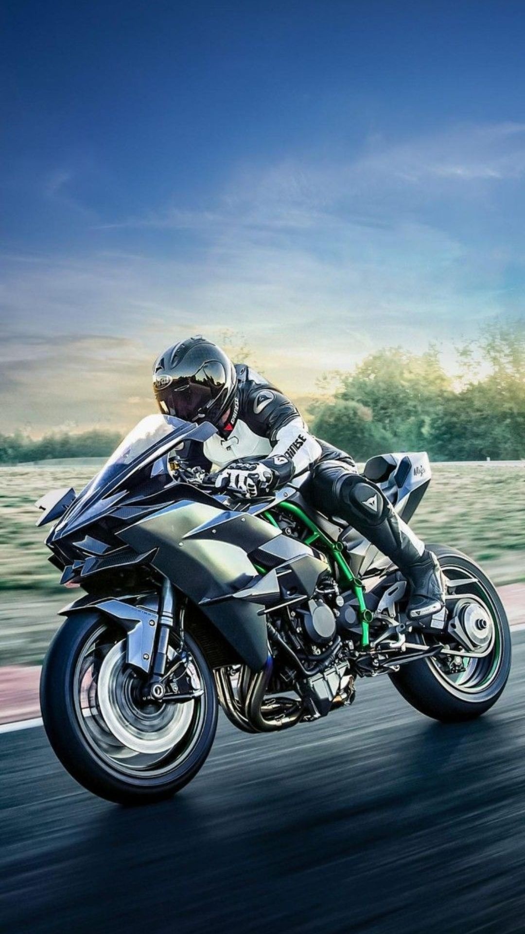 Kawasaki Ninja H2R, Leather-suited rider, Race track wheelie, Sunset motion blur Kawasaki Ninja H2R, Leather-suited rider, Race track wheelie, Sunset motion blur — 1080×1920 HD wallpaper